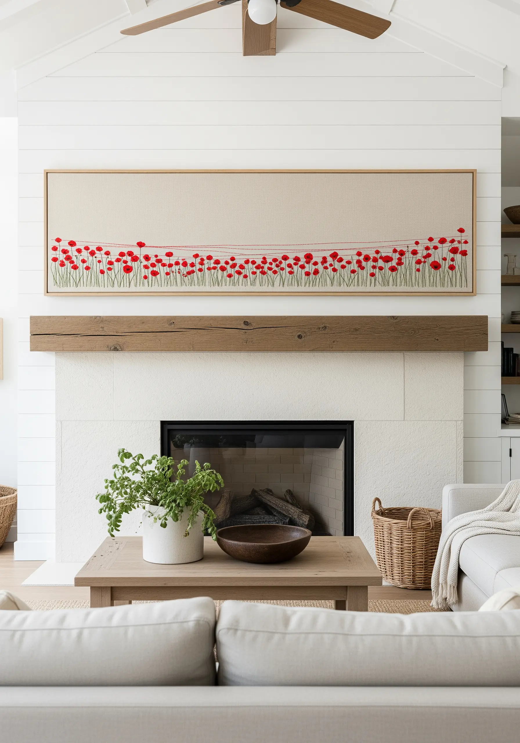 A long, panoramic framed embroidery showing a minimalist field of red poppies connected by lines.