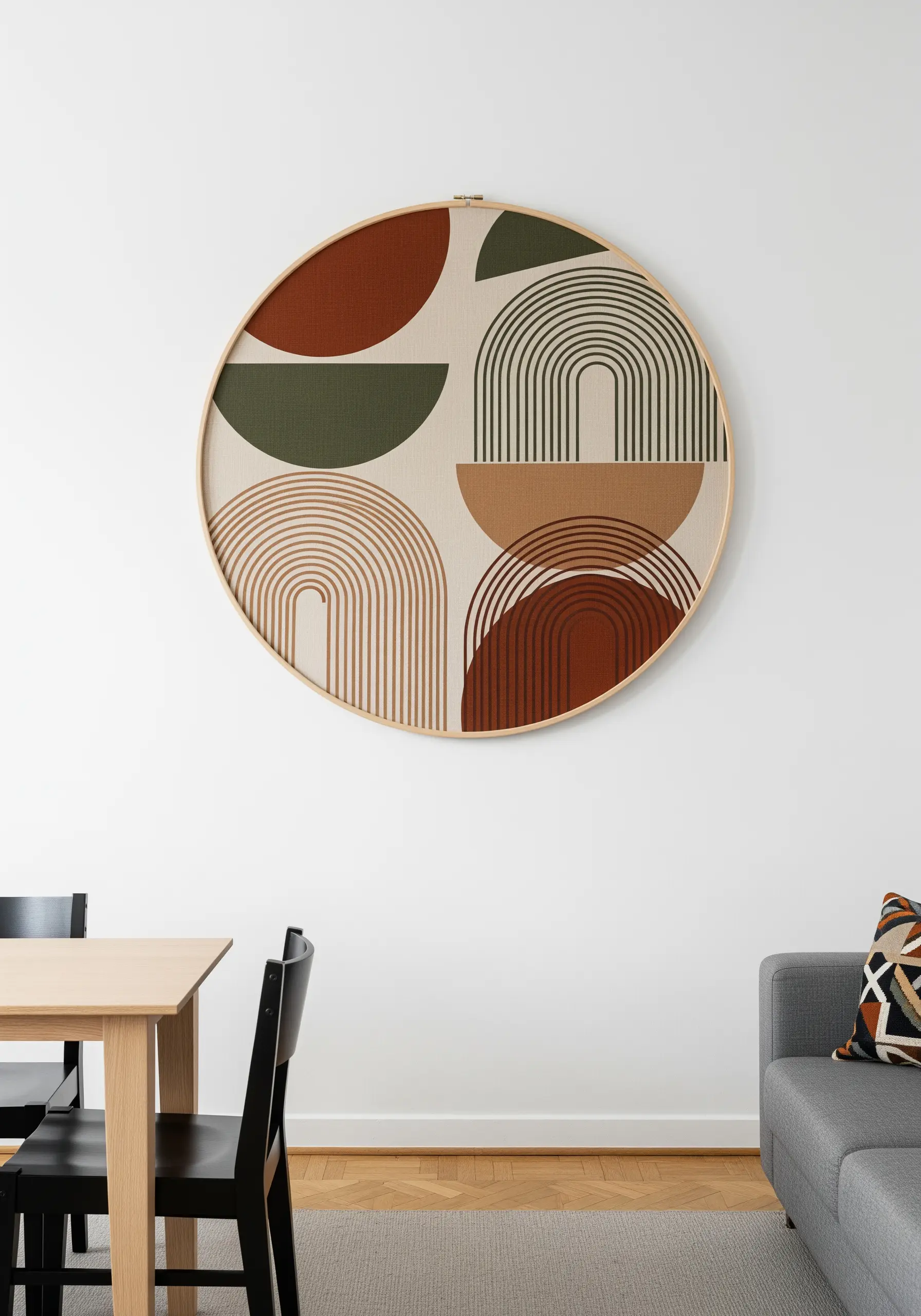 Large abstract boho embroidery with rainbows and semi-circles in earth tones.