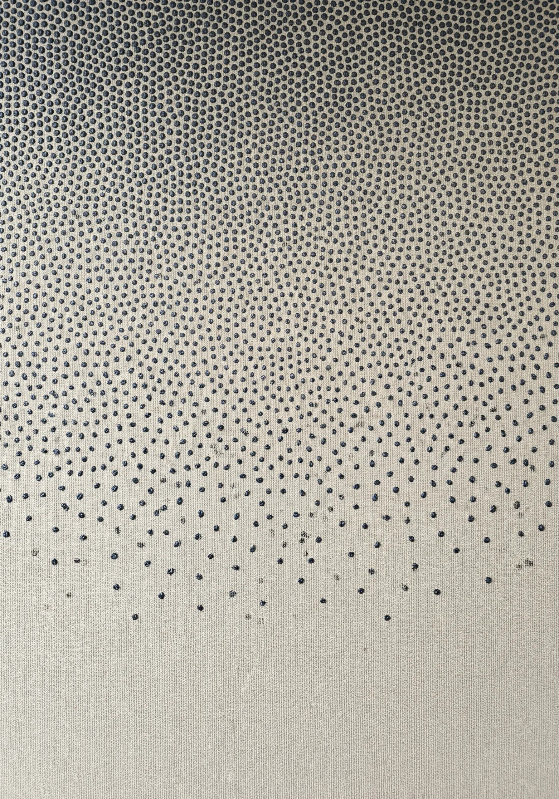 A gradient of dark blue French knots, dense at the top and sparse at the bottom.