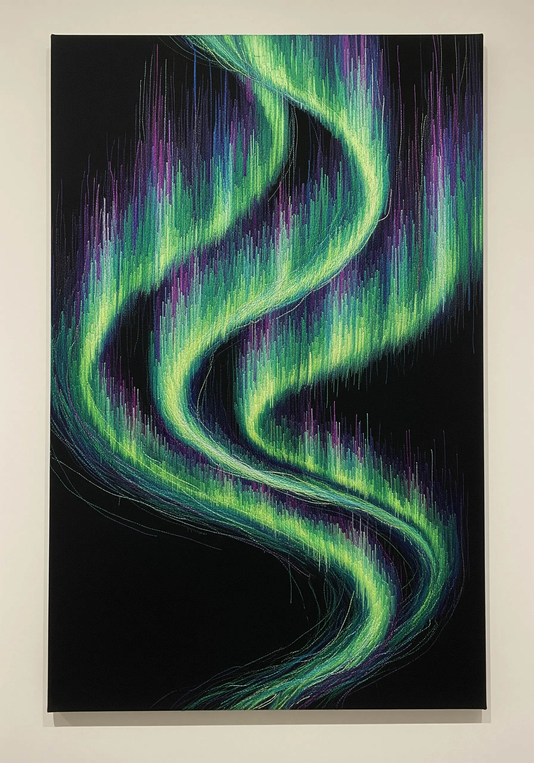 Large thread painting of the aurora borealis using vertical stitches on black canvas.