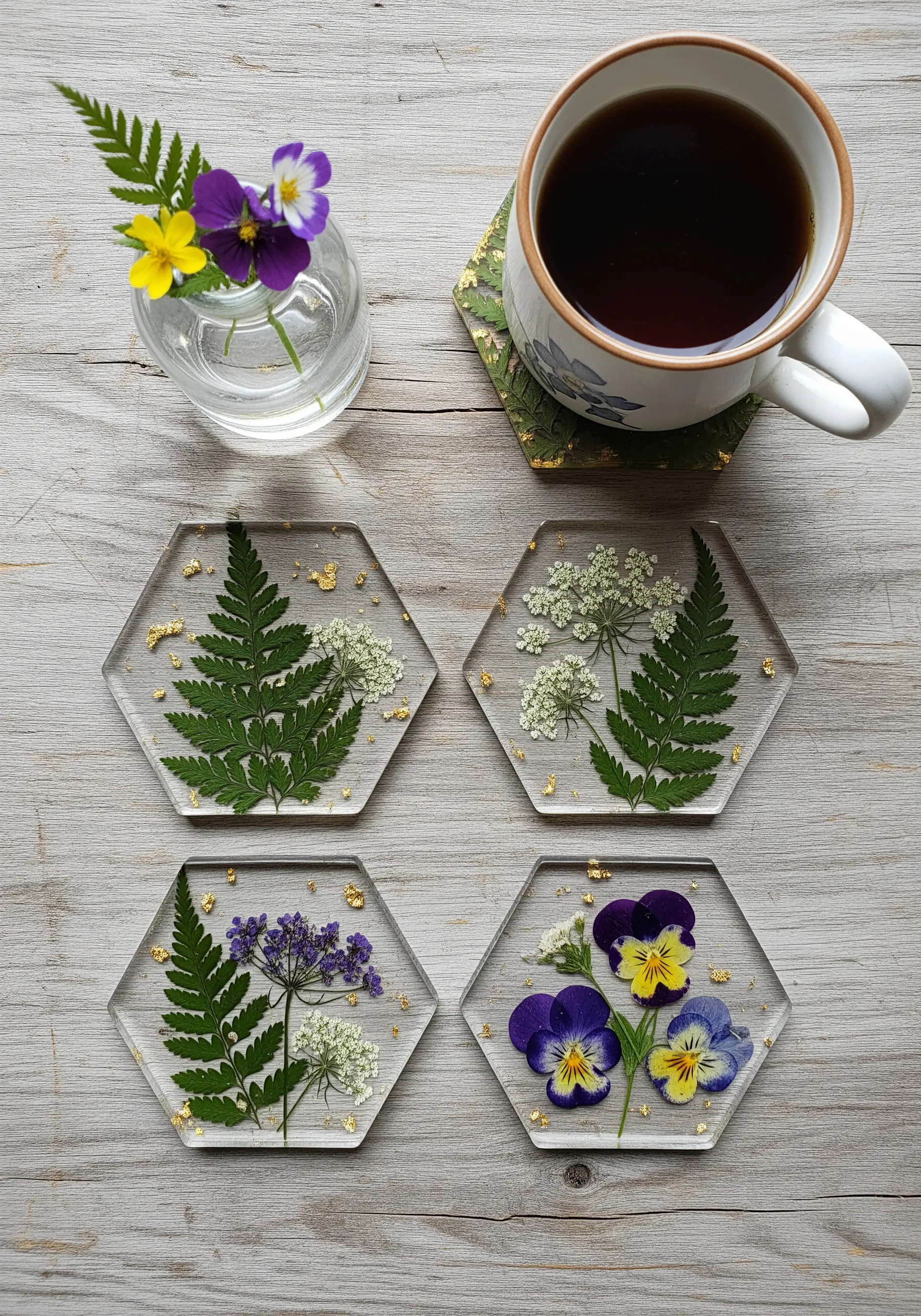 Hexagonal resin coasters with pressed ferns, flowers, and gold leaf