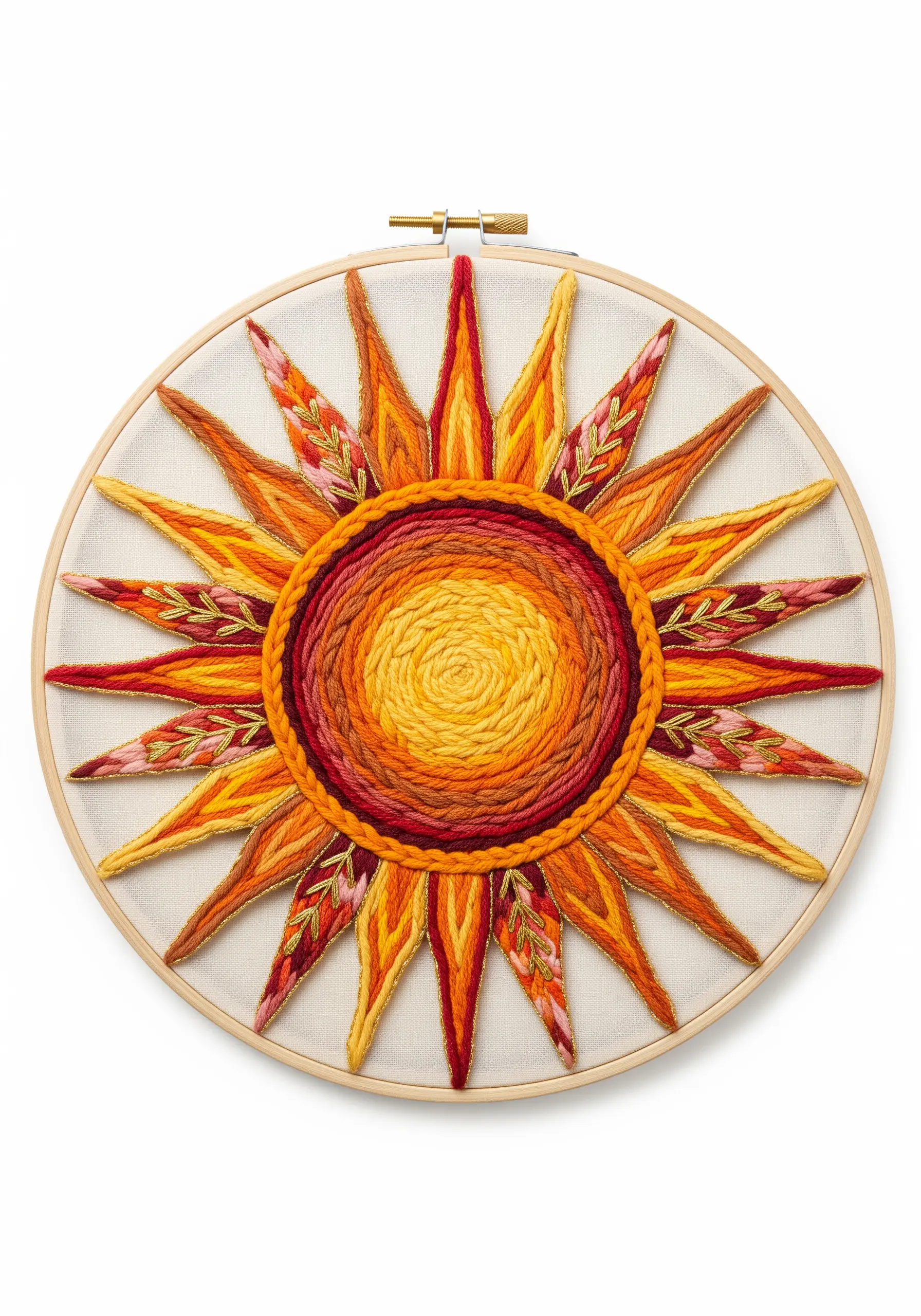 A stylized sun embroidered with thick, couched yarn in shades of orange, red, and yellow.
