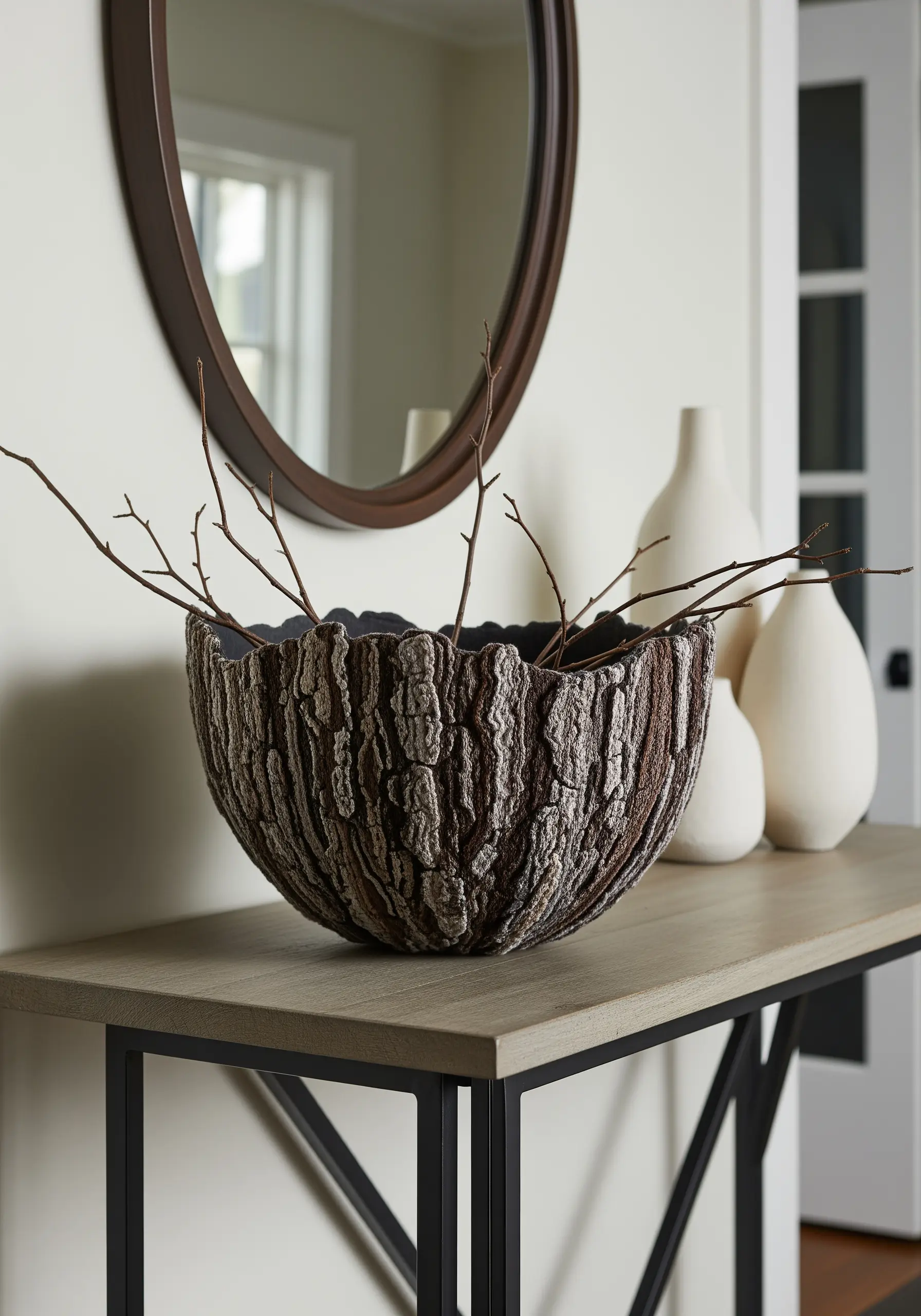 A decorative bowl covered in dense embroidery that mimics the texture of tree bark.