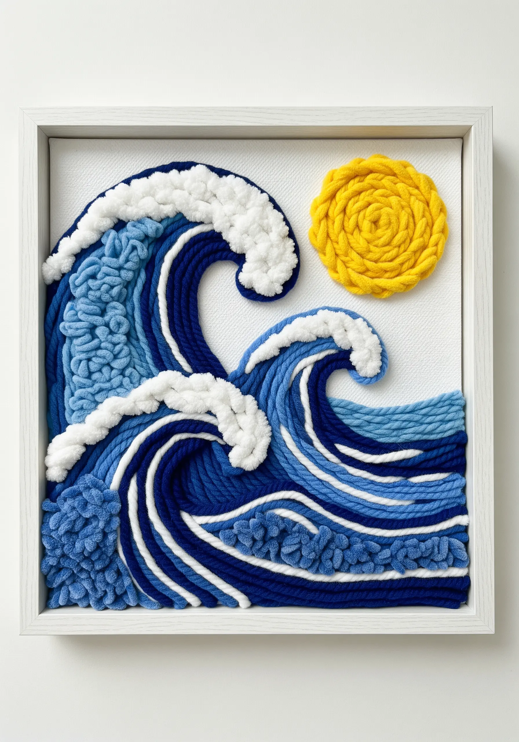 A framed punch needle piece depicting crashing ocean waves with textured white foam.
