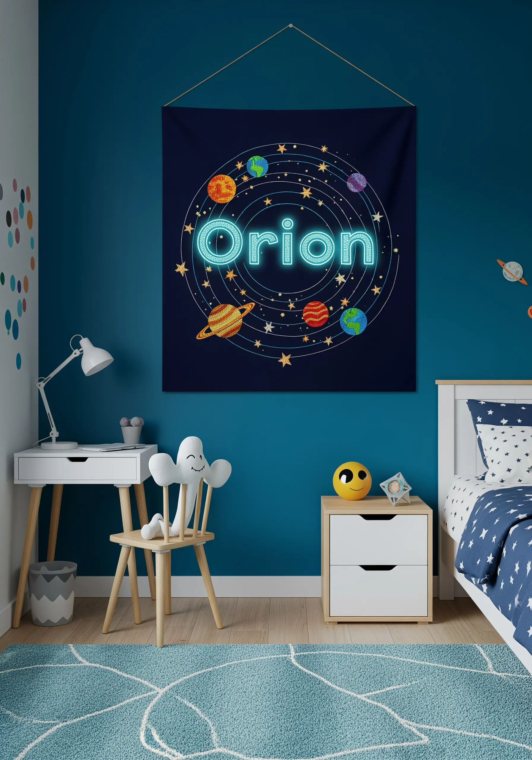 Space-themed wall hanging with the name 'Orion' embroidered in glowing neon thread.