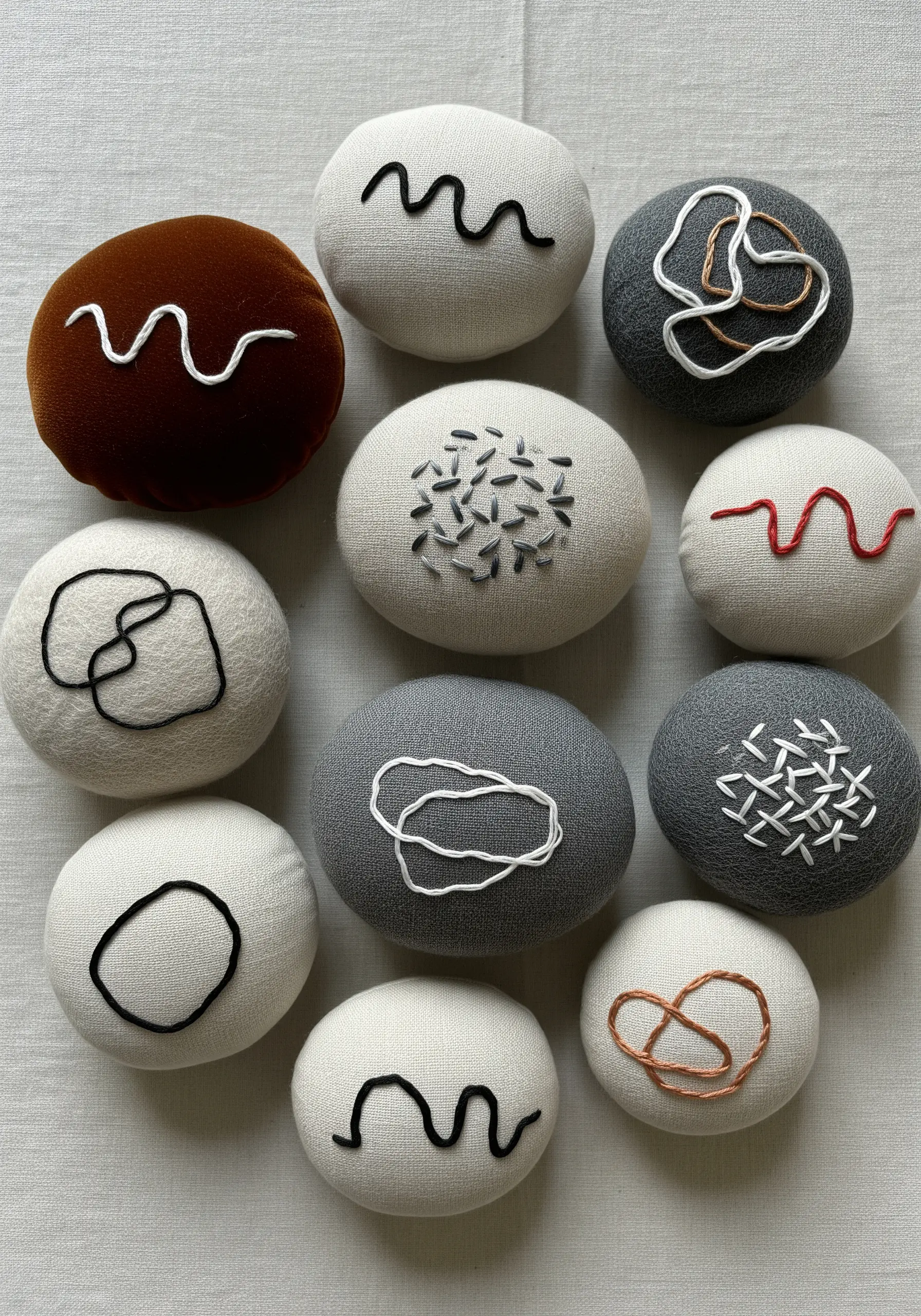 A collection of small, round fabric 