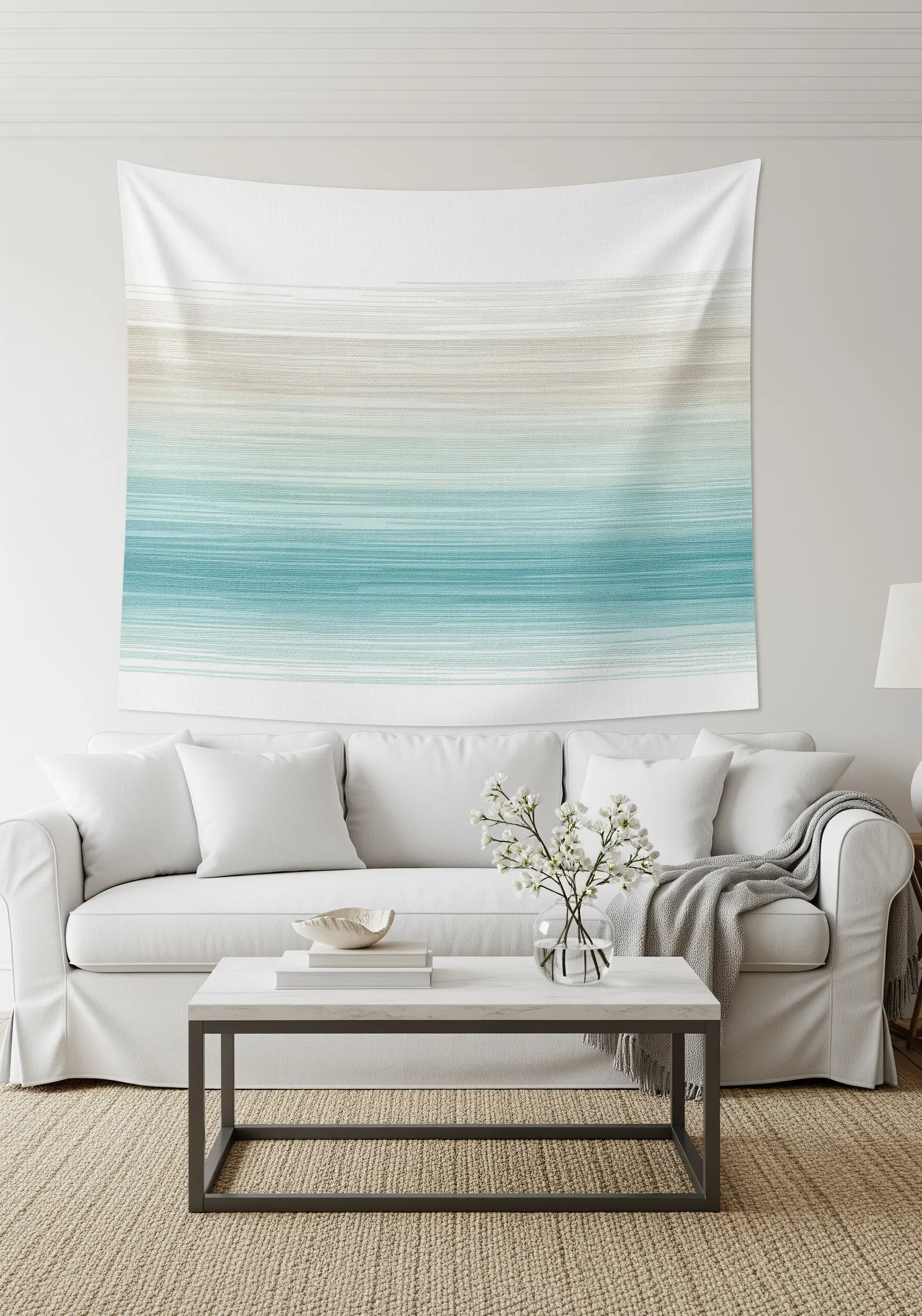 A large wall tapestry with horizontal straight stitches creating a soft, blended coastal gradient.