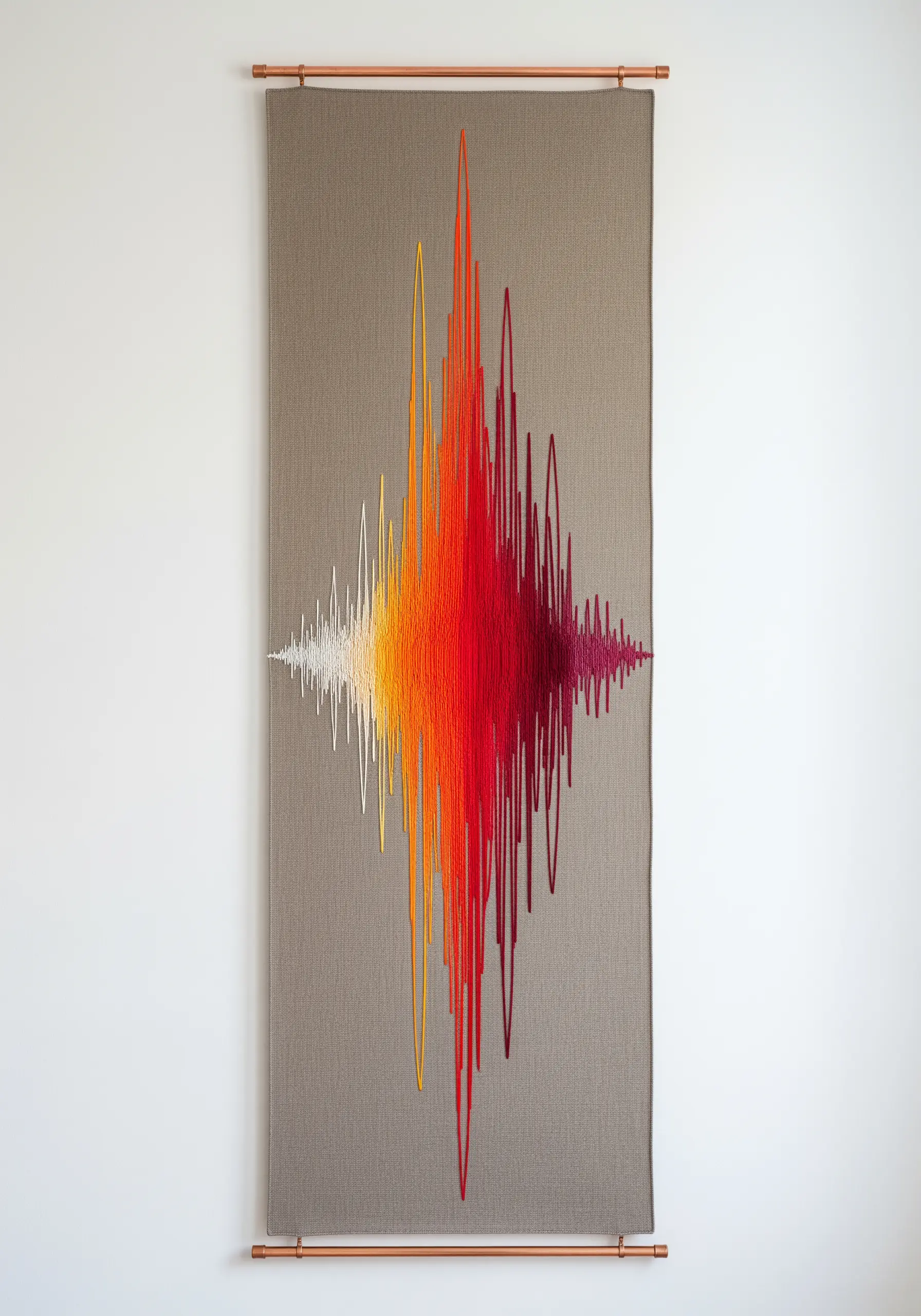 A long wall hanging with a soundwave pattern made of cascading threads in a fiery gradient.