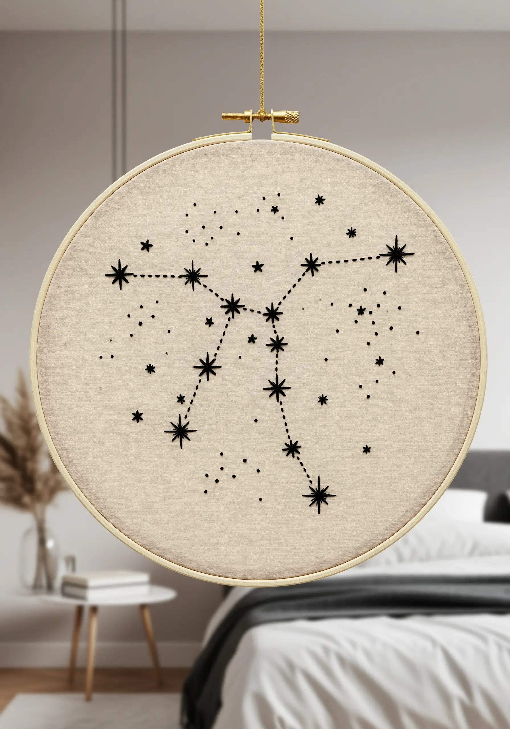 A black-thread constellation chart with stars of varying sizes connected by delicate lines.