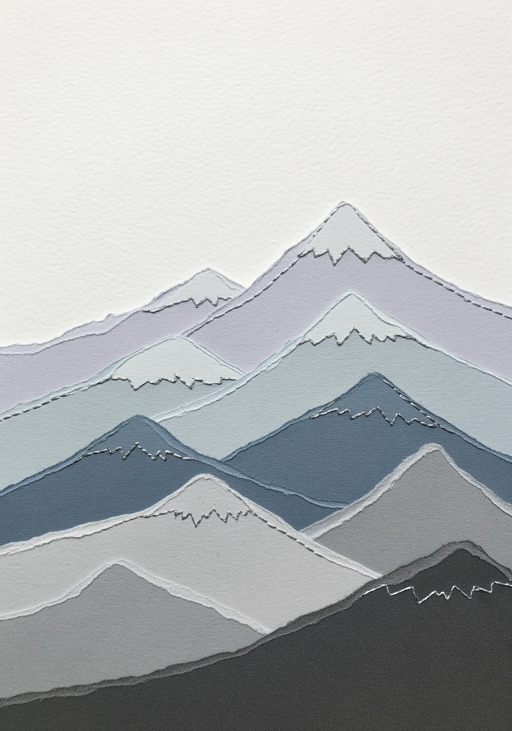 A minimalist landscape of layered paper mountains with white stitched snowcaps.
