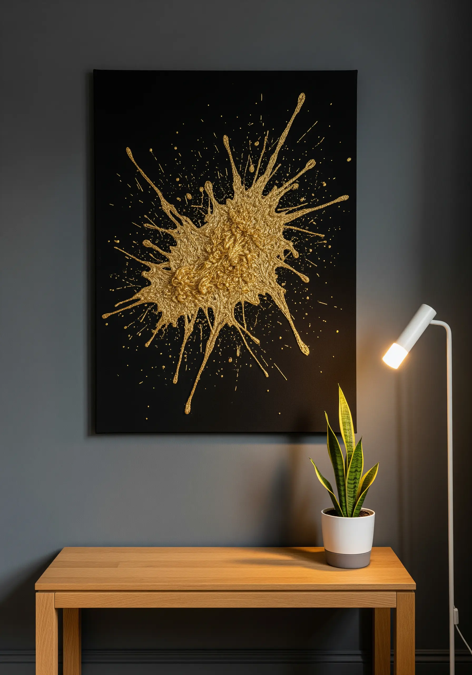 3D gold thread splash embroidery on a black canvas.