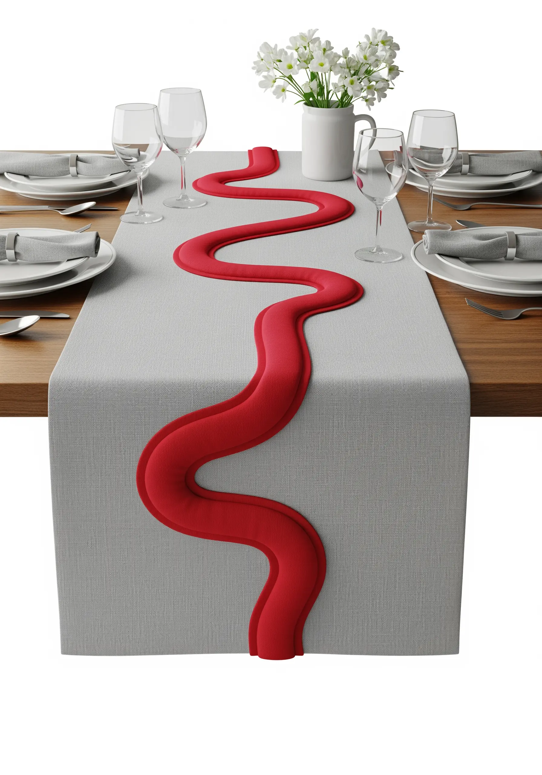 A single, raised, sculptural red embroidered wave running down the center of a grey table runner.