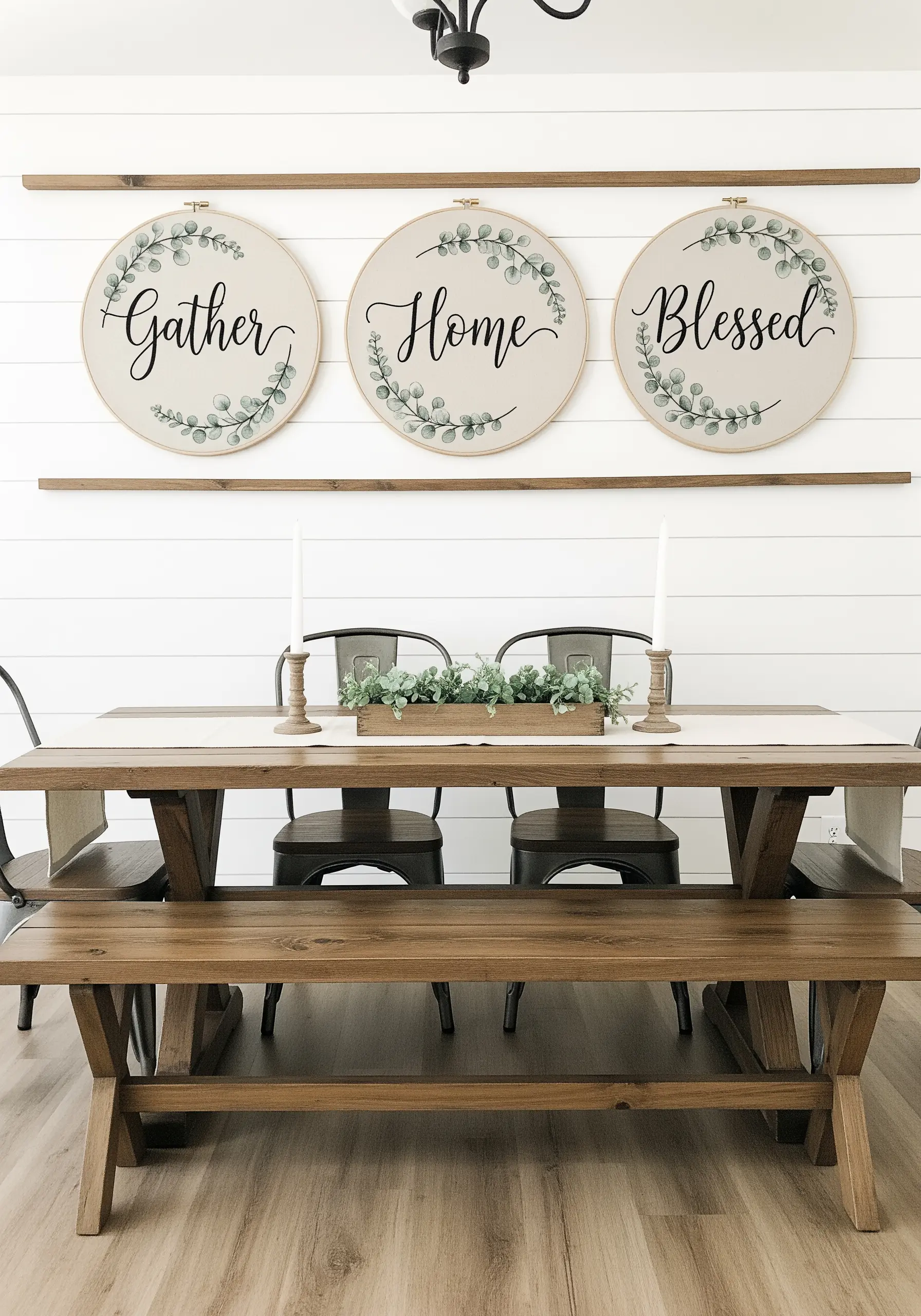 Three large hoops with the words 'Gather,' 'Home,' and 'Blessed,' decorated with leafy wreaths.