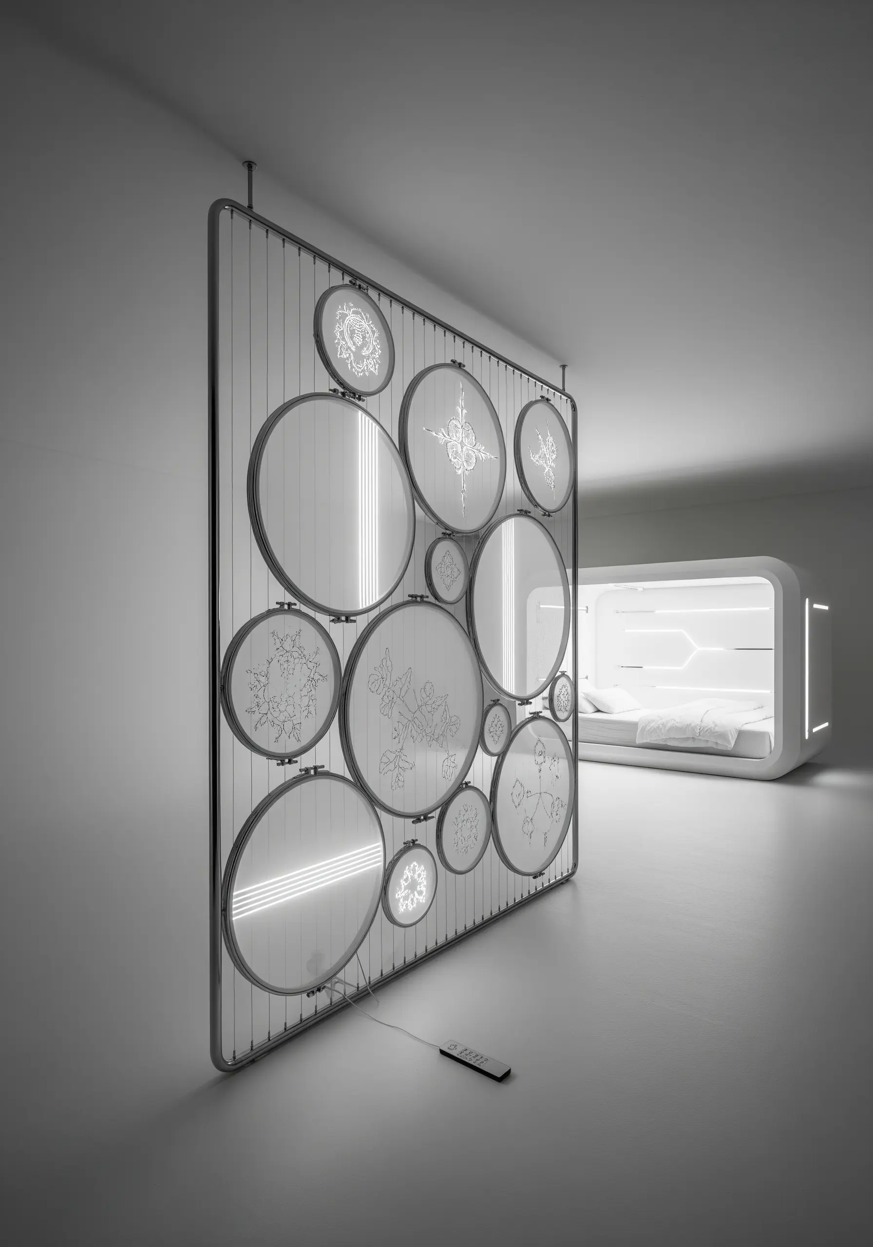 White lace-like embroidery on sheer fabric, backlit with LED lights in a futuristic room.