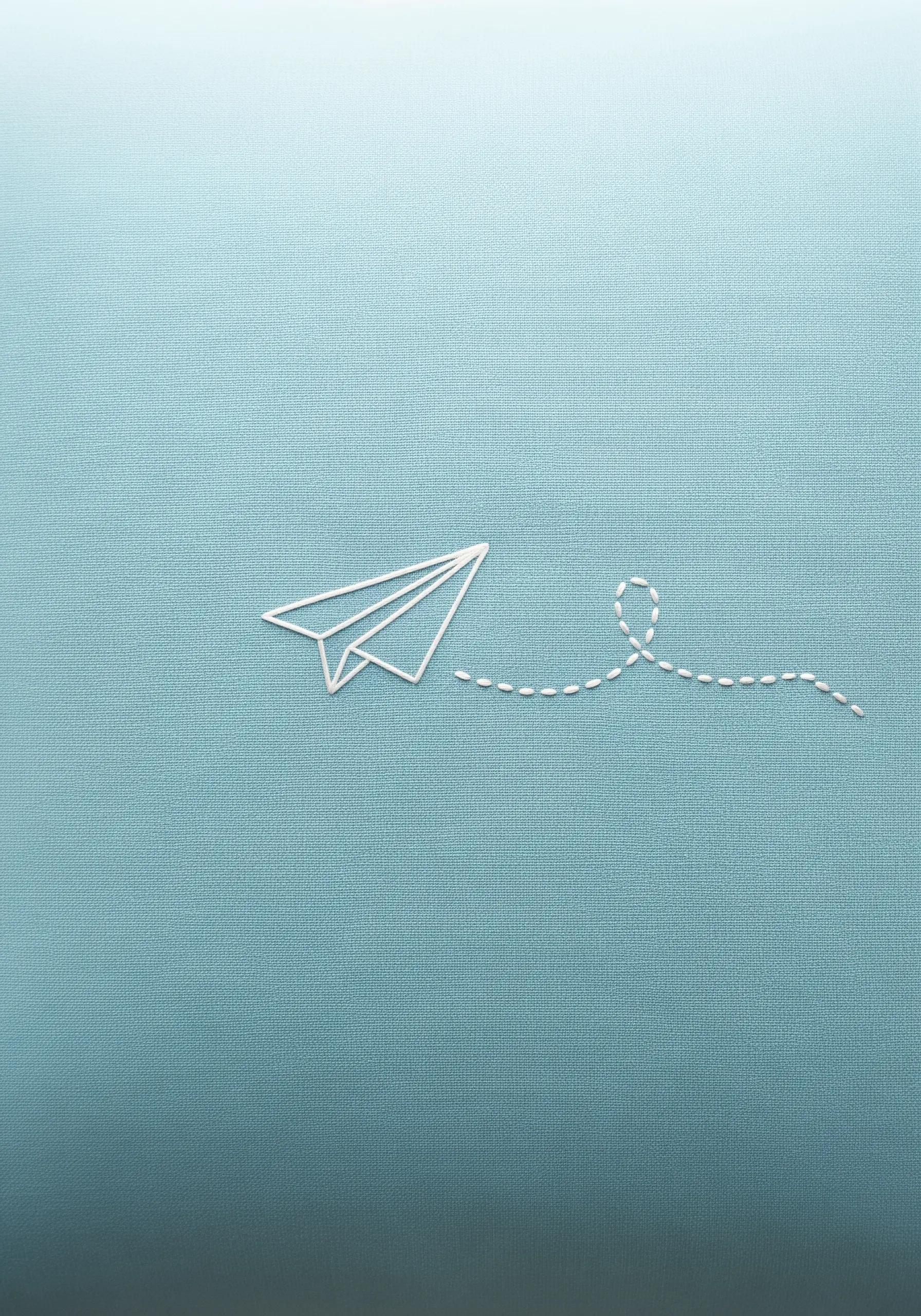A simple white line embroidery of a paper plane with a dotted-line trail on blue fabric.