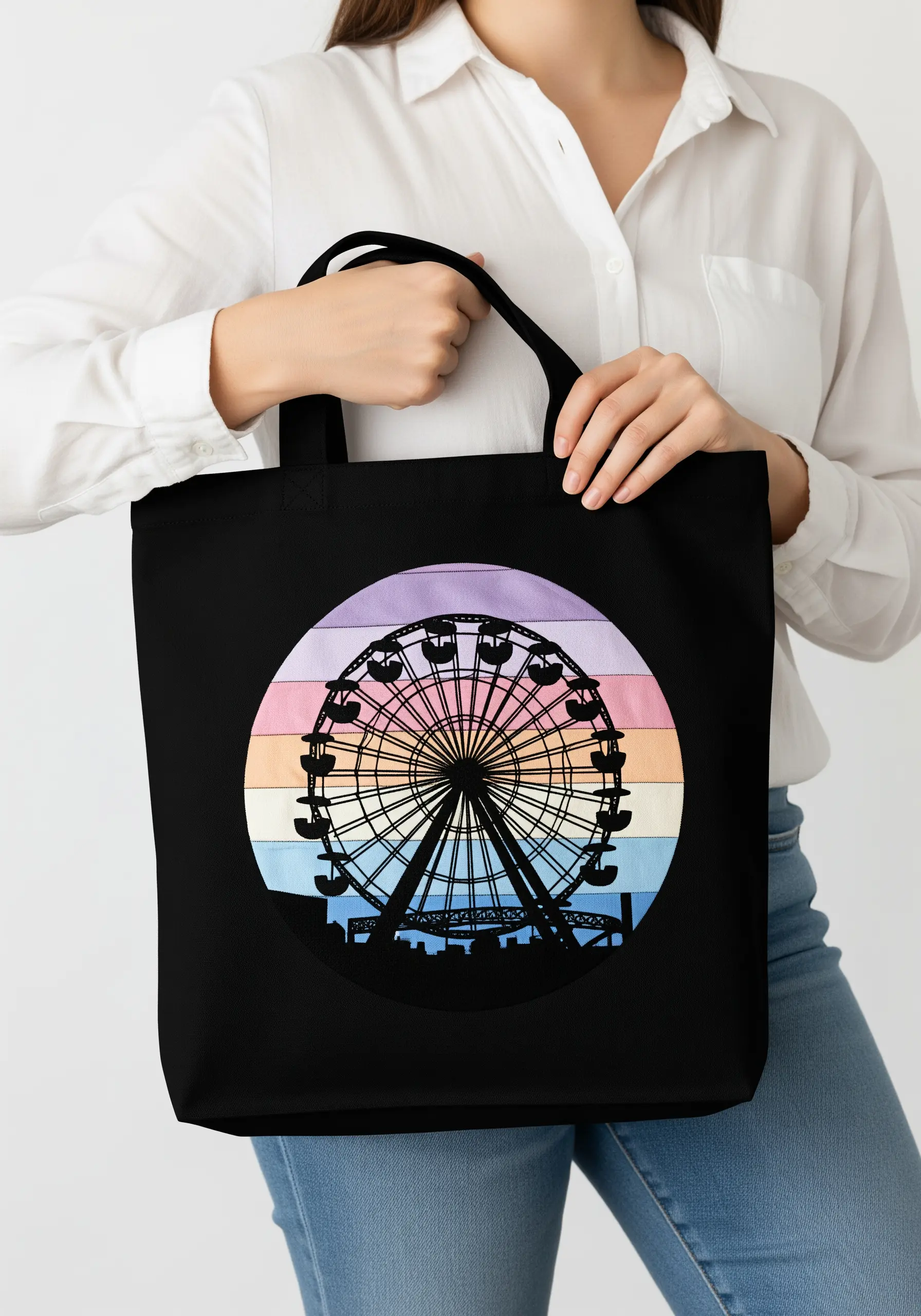 A black ferris wheel silhouette embroidered over a pastel striped appliqué background.