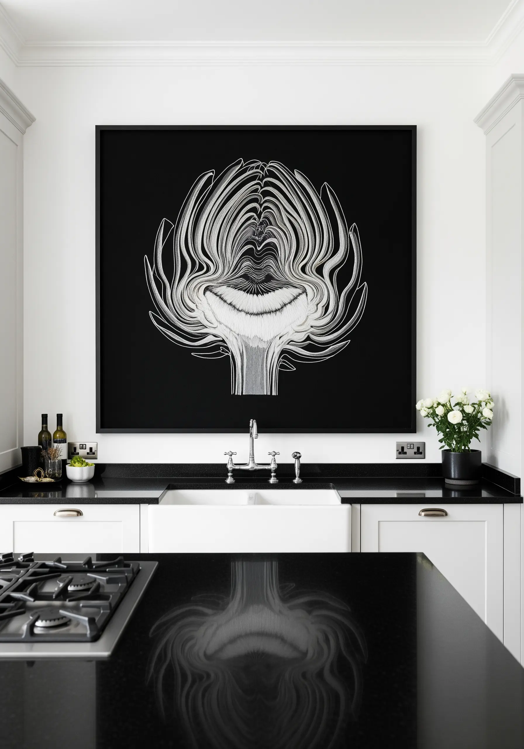 Large-scale, abstract white-on-black line embroidery of an artichoke over a kitchen sink.