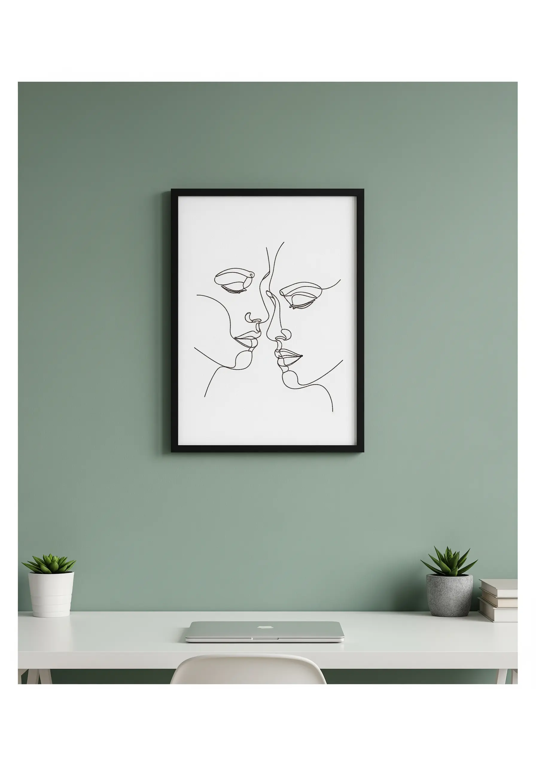 Framed line art embroidery of two faces touching, stitched on white paper.