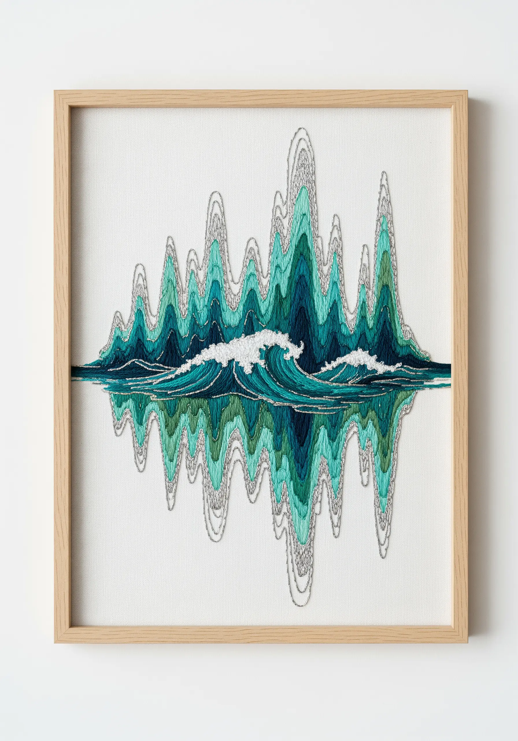 Abstract ocean waves embroidered as a symmetrical soundwave pattern in shades of teal and green.