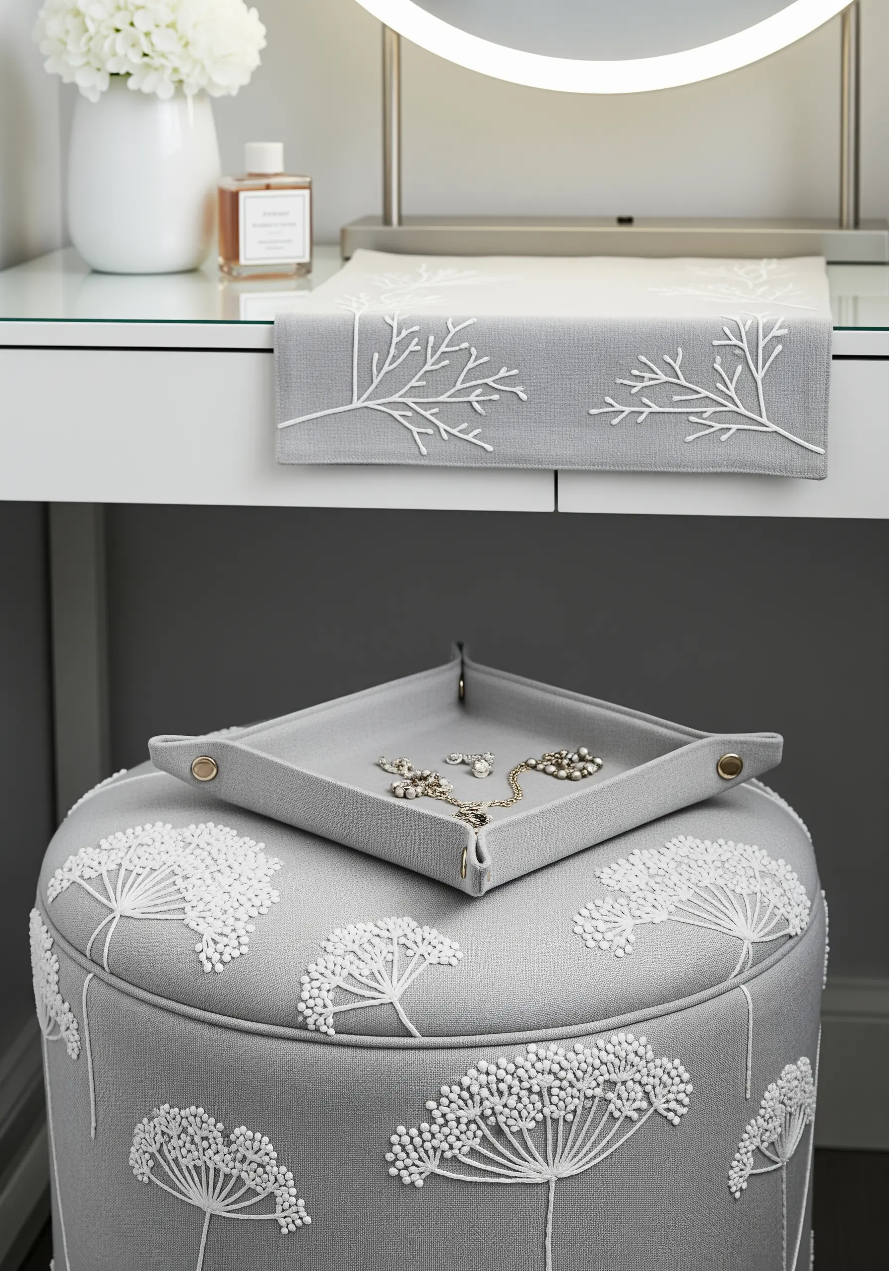 Grey vanity stool and tray embroidered with white Queen Anne's Lace flowers.
