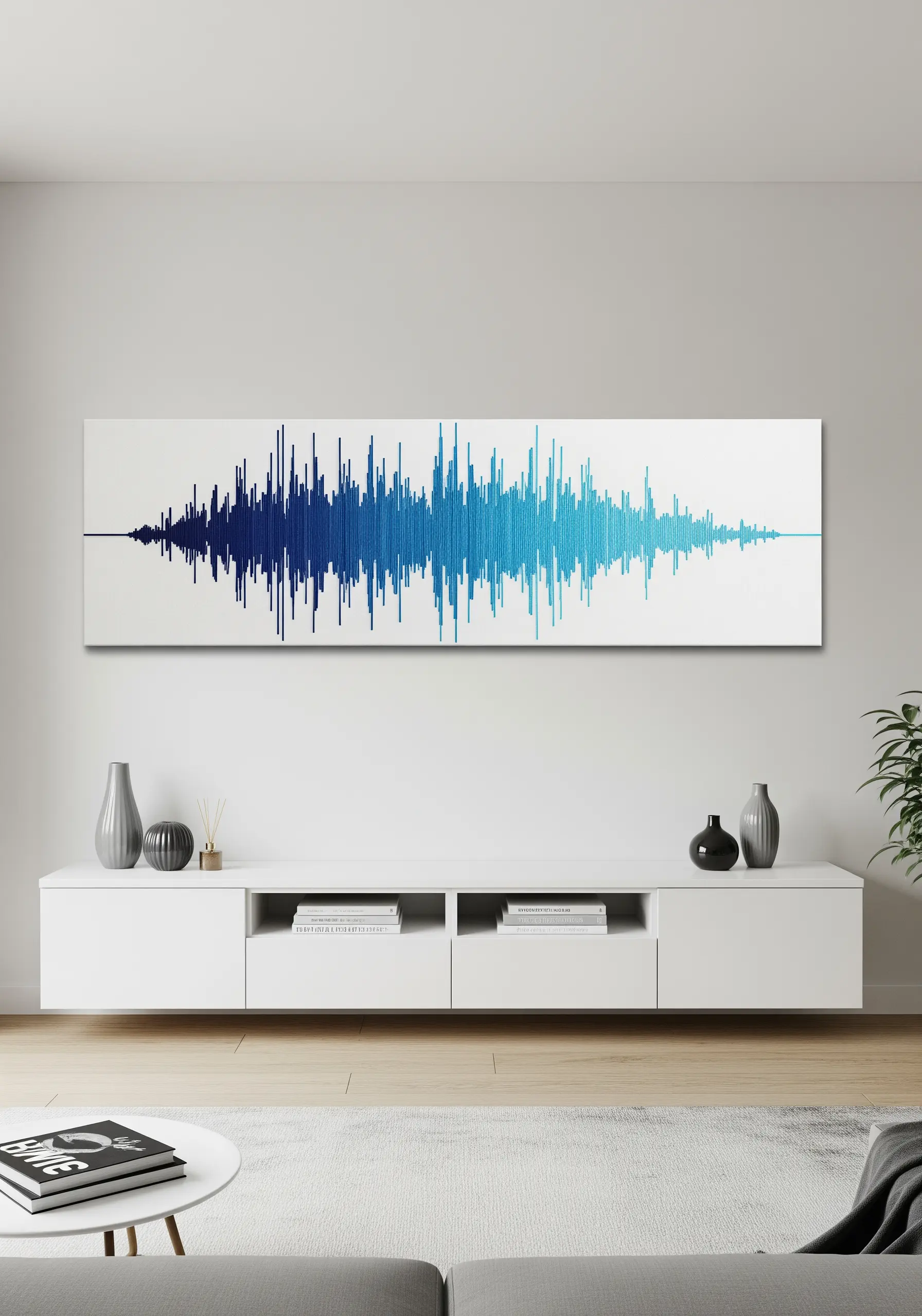 A soundwave embroidered in a blue gradient on a long white canvas above a media console.