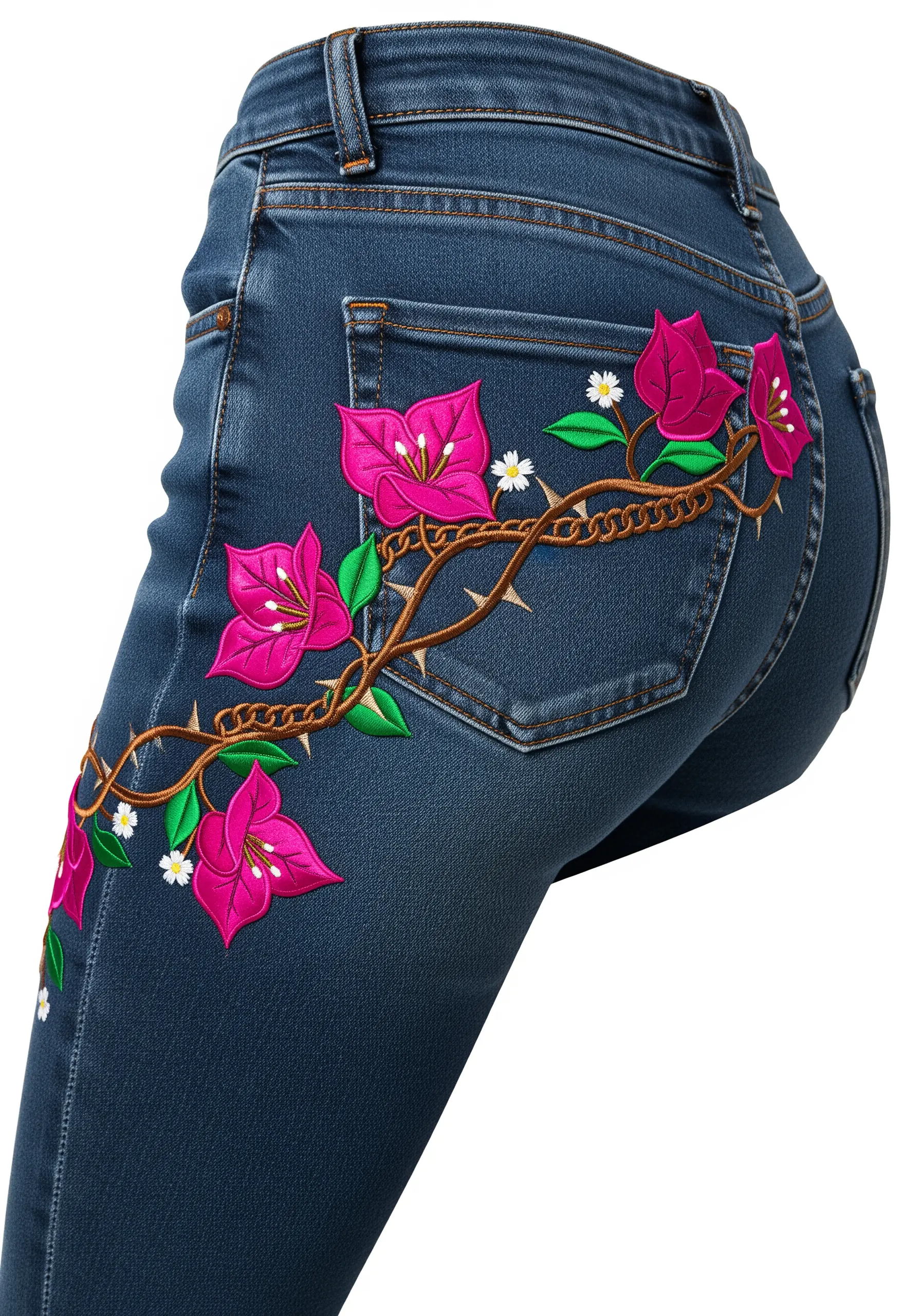 A vine of thorny bougainvillea with bright pink flowers wrapping around the hip of jeans.