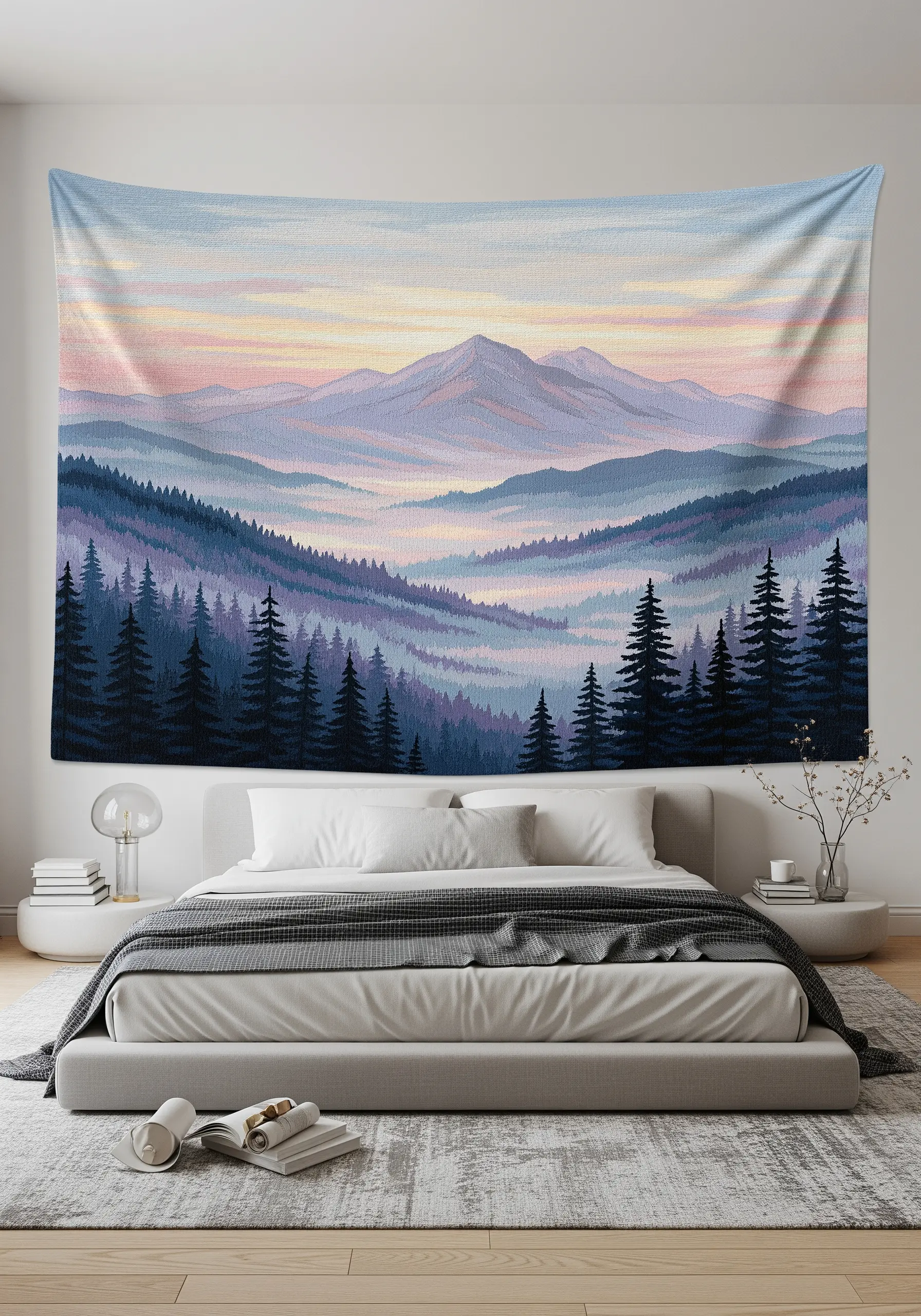 A large embroidered tapestry of a mountain range at sunset hanging above a bed.