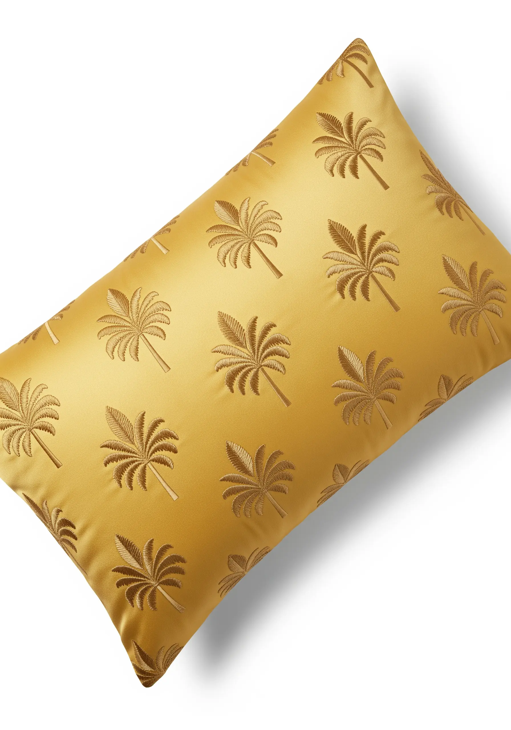 A tone-on-tone repeat pattern of small palm trees on a gold satin cushion.