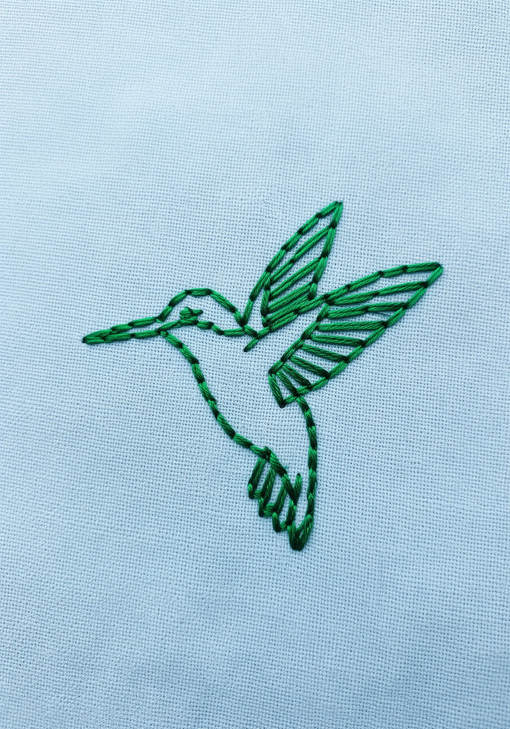 A minimalist green line art hummingbird with open-fill wings.