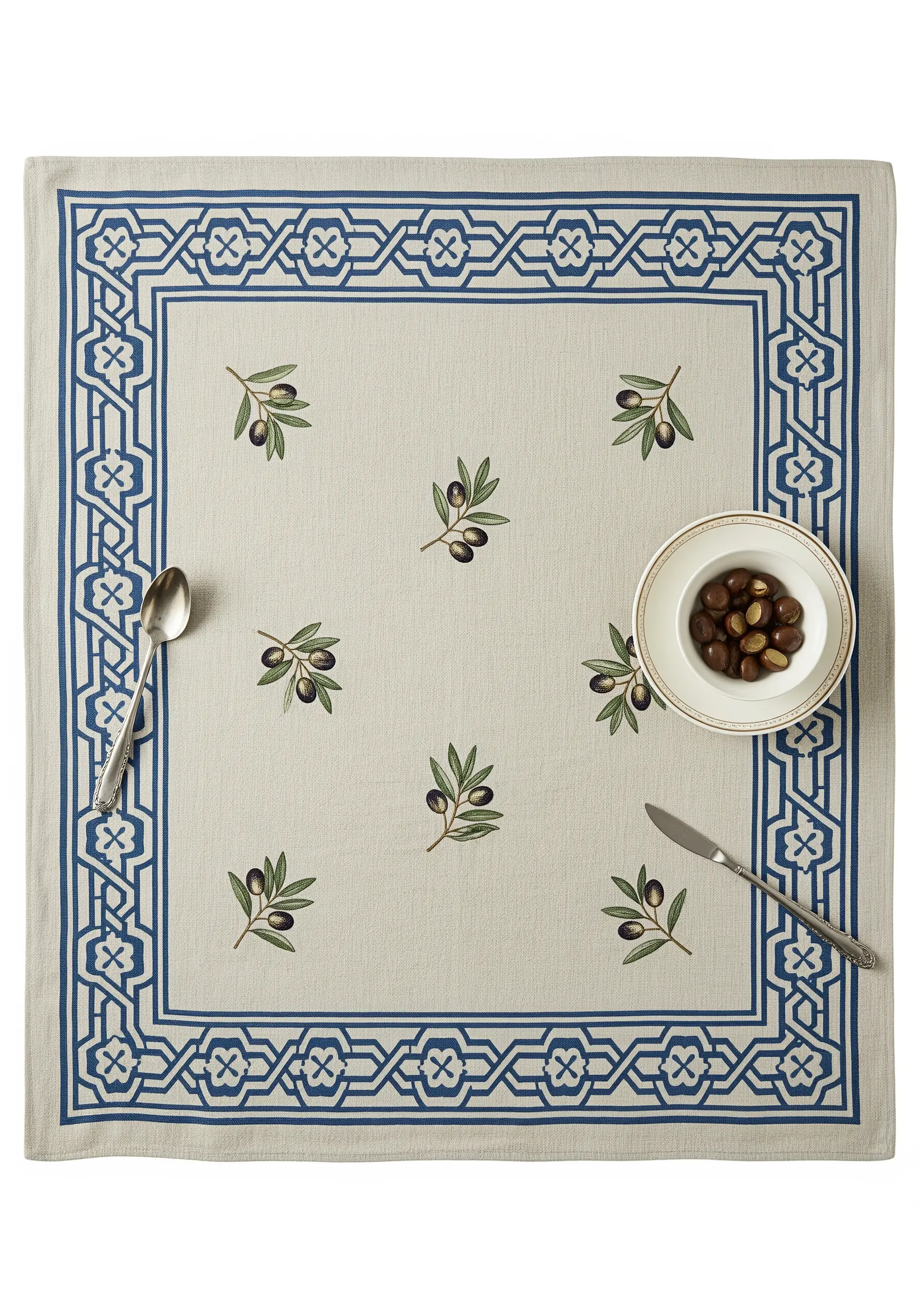 Placemat with a bold blue geometric border and small, scattered olive motifs.