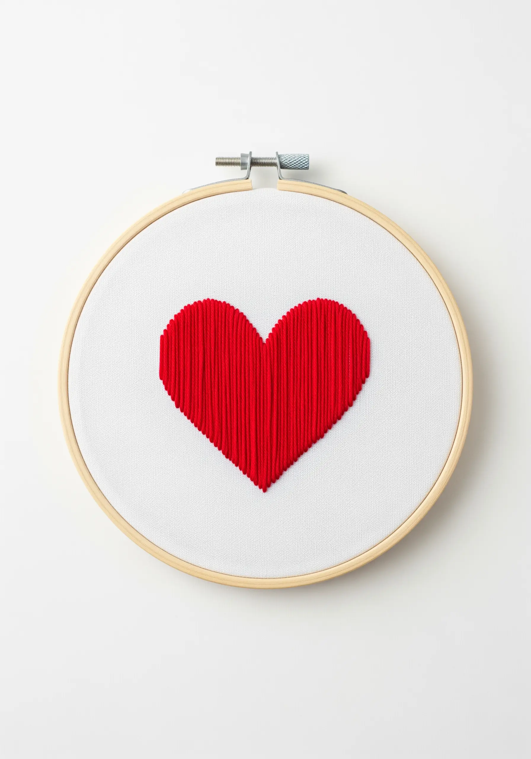 Bright red heart embroidery using vertical satin stitch