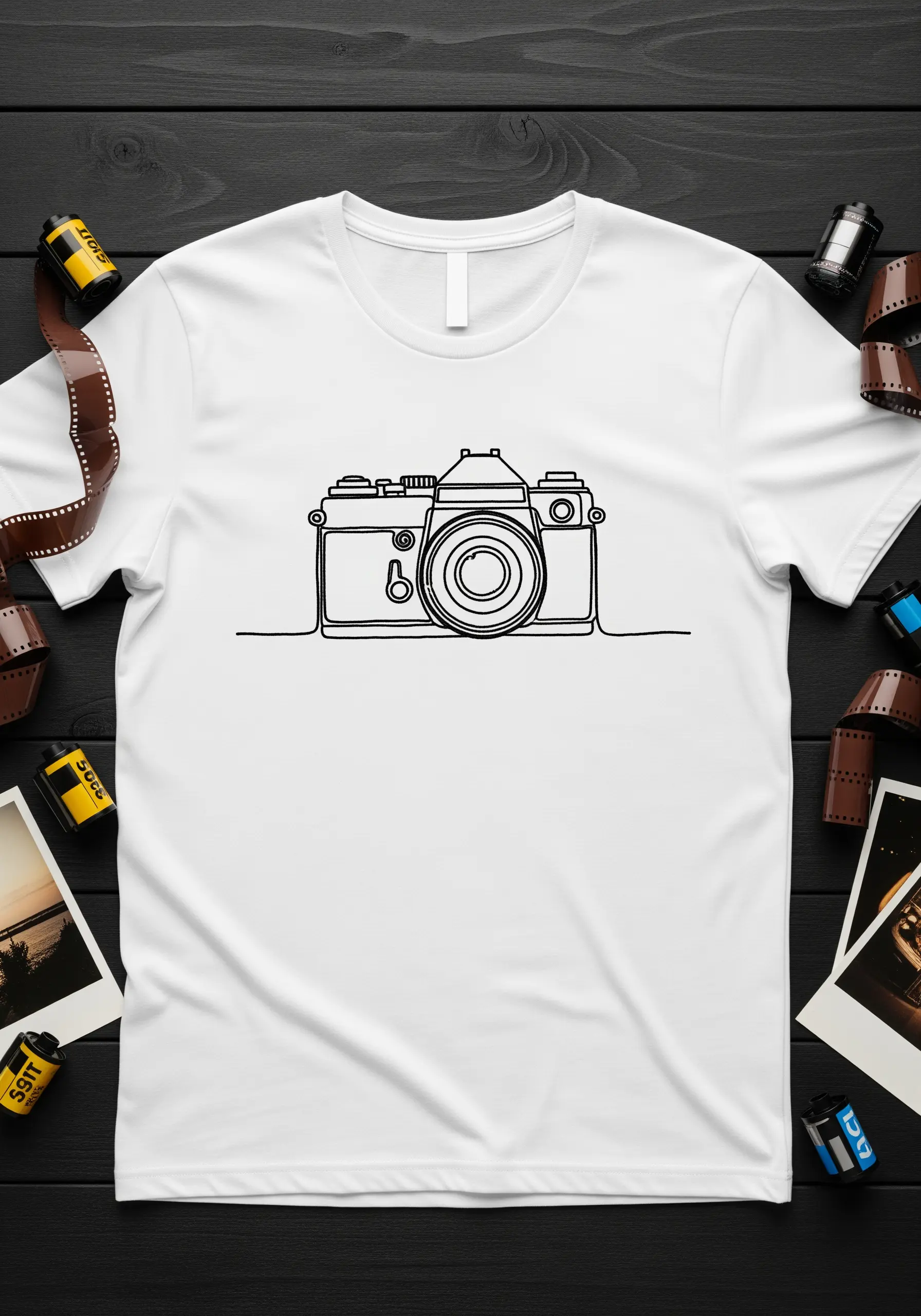 A vintage film camera drawn in a single continuous black line on a white t-shirt.