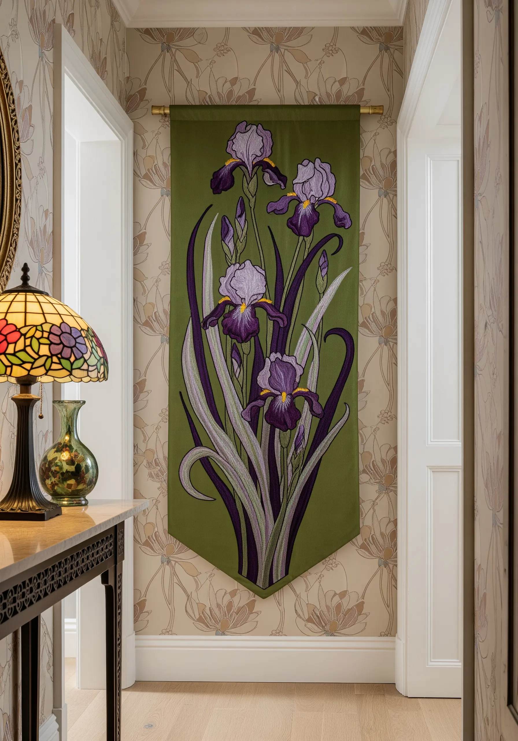 An Art Nouveau-style embroidery of purple irises on an olive green banner.