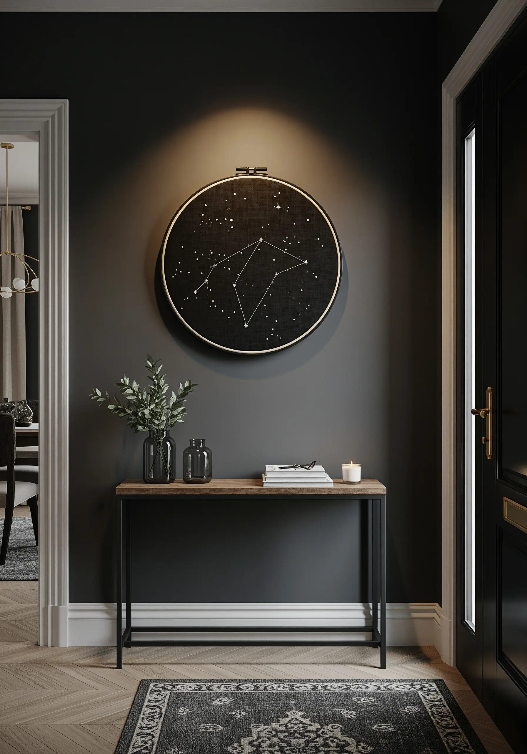 A white-thread constellation with French knot stars on black fabric in a hoop.