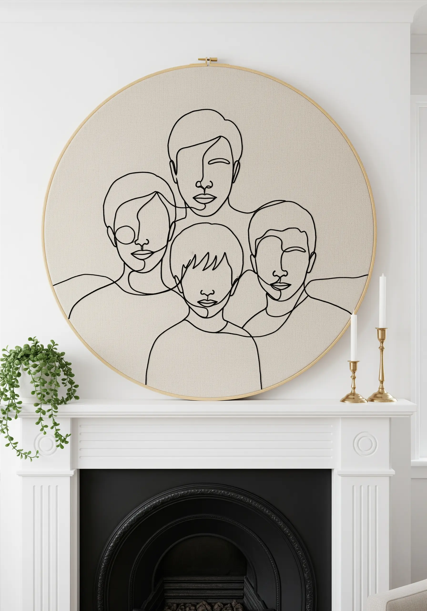 A large-scale single-line family portrait of four people on a neutral fabric.
