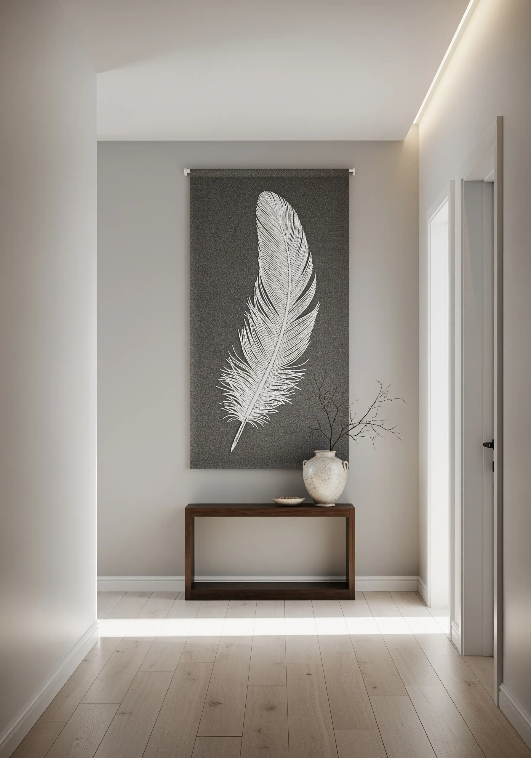 A large, realistic white feather embroidered with delicate shading on a grey banner.