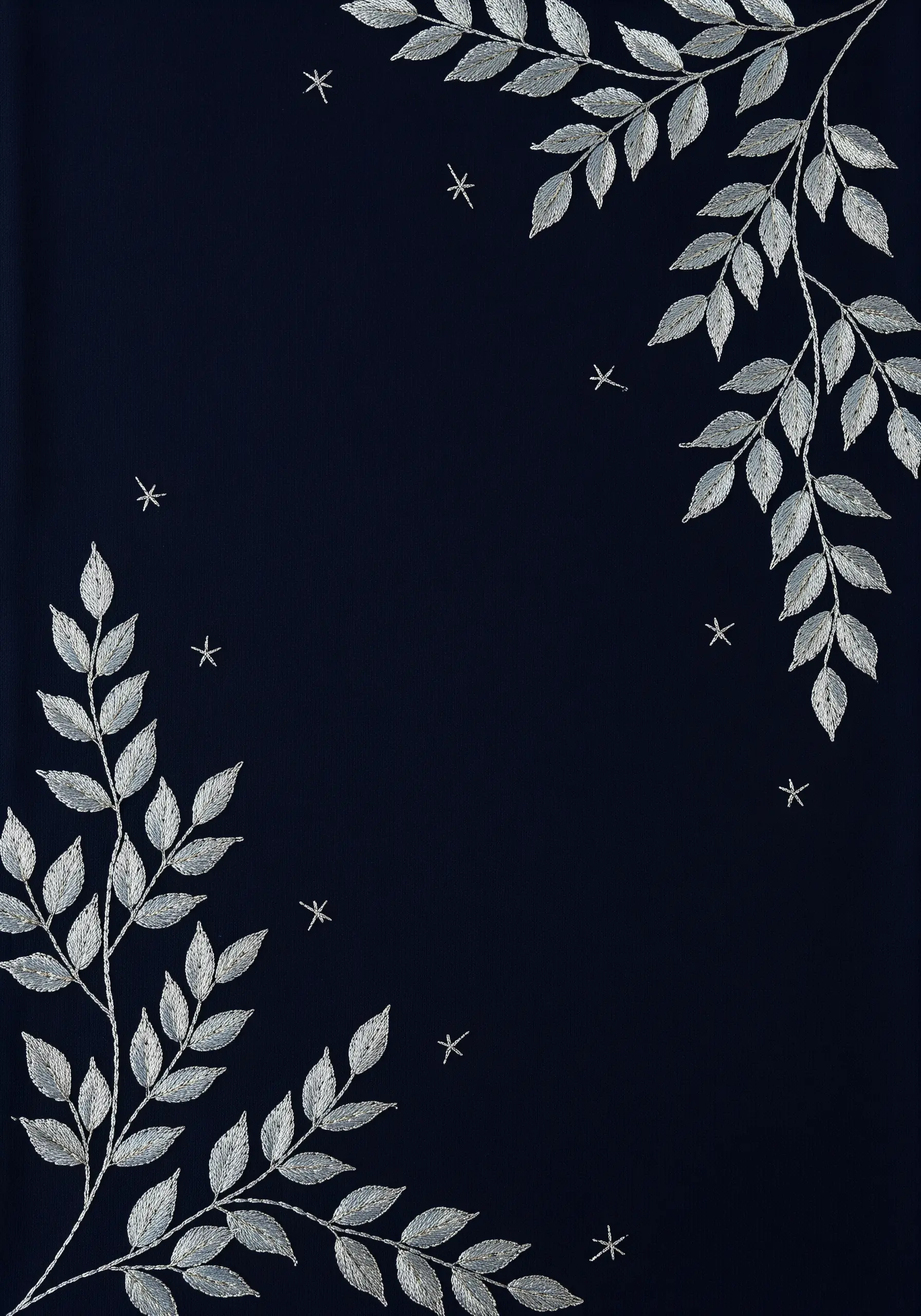 Silver-embroidered branches with leaves on a dark navy background, accented with tiny star stitches.