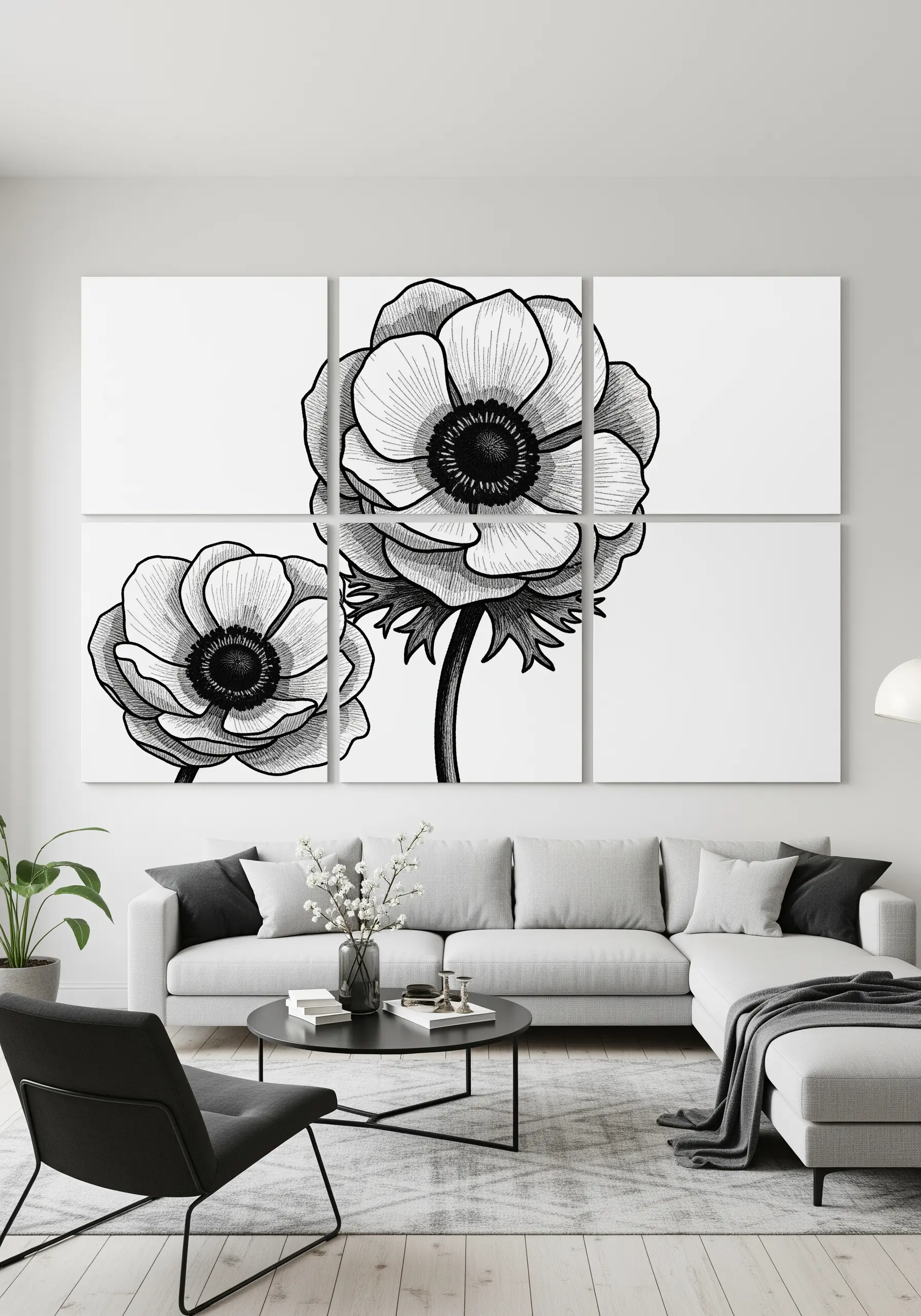A multi-panel wall art piece showing a large black and white embroidered anemone flower.