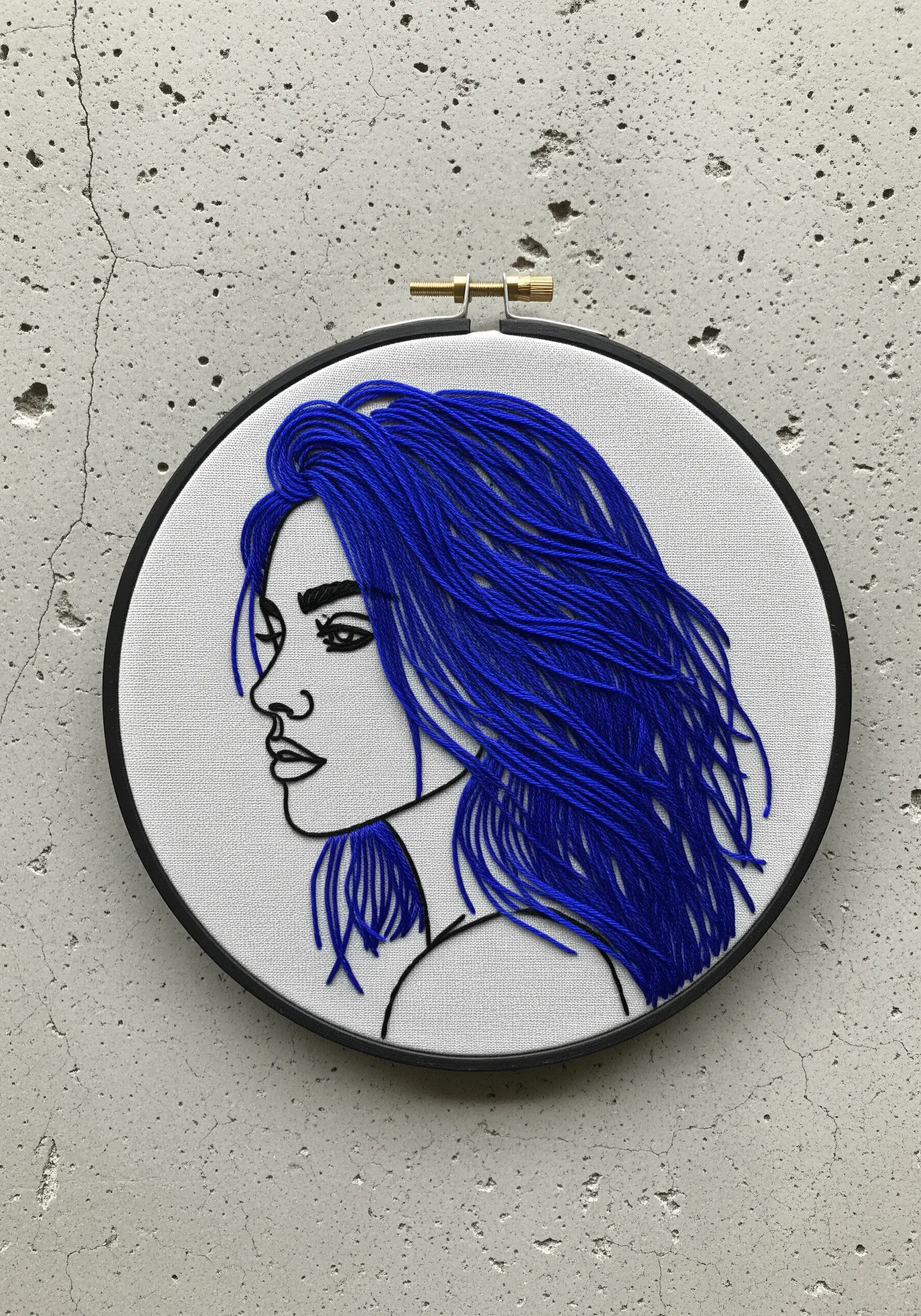 Line-art portrait with vibrant blue hair created with long, layered stitches.