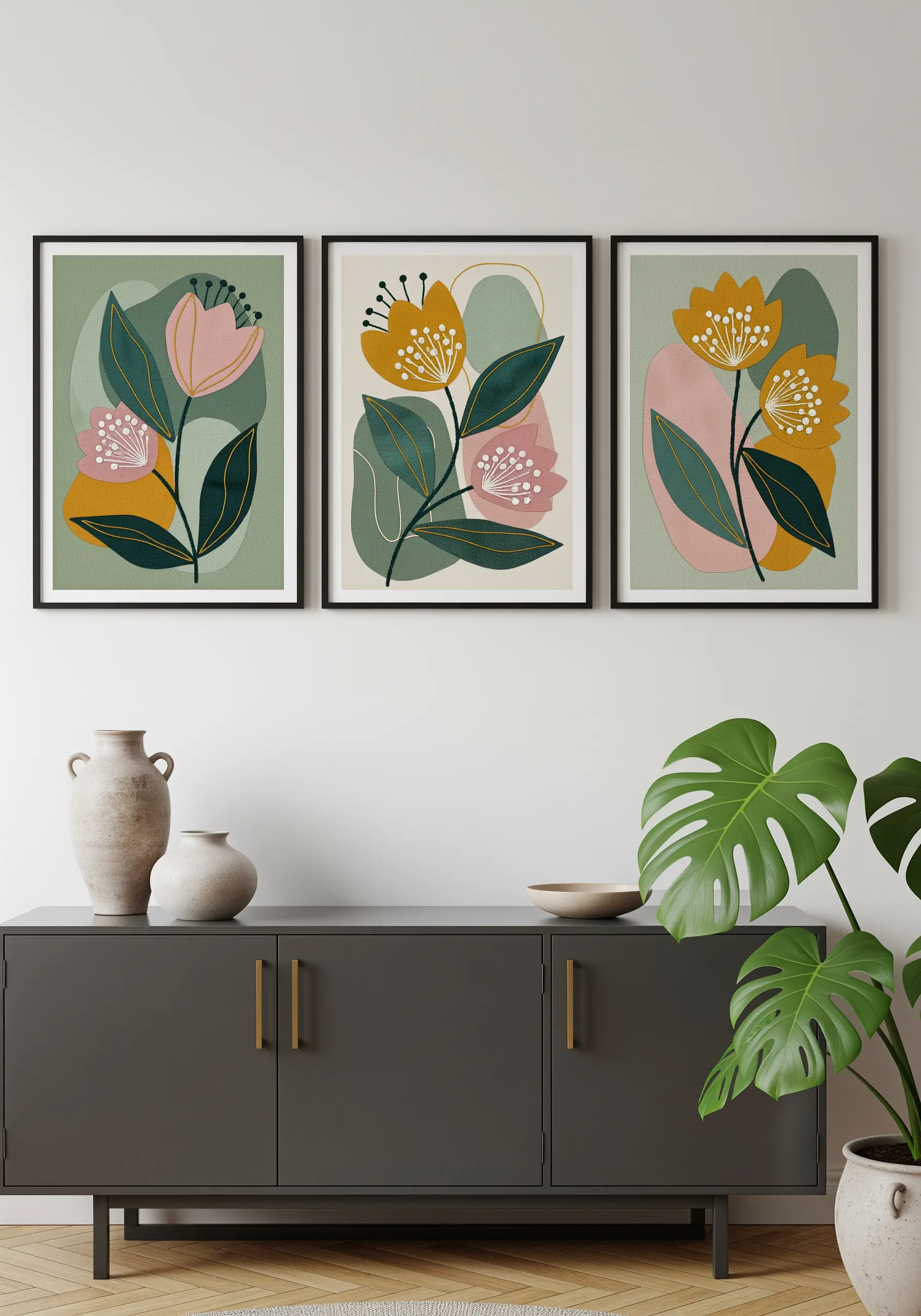 A triptych of framed fabric collage art depicting modern, graphic flowers.