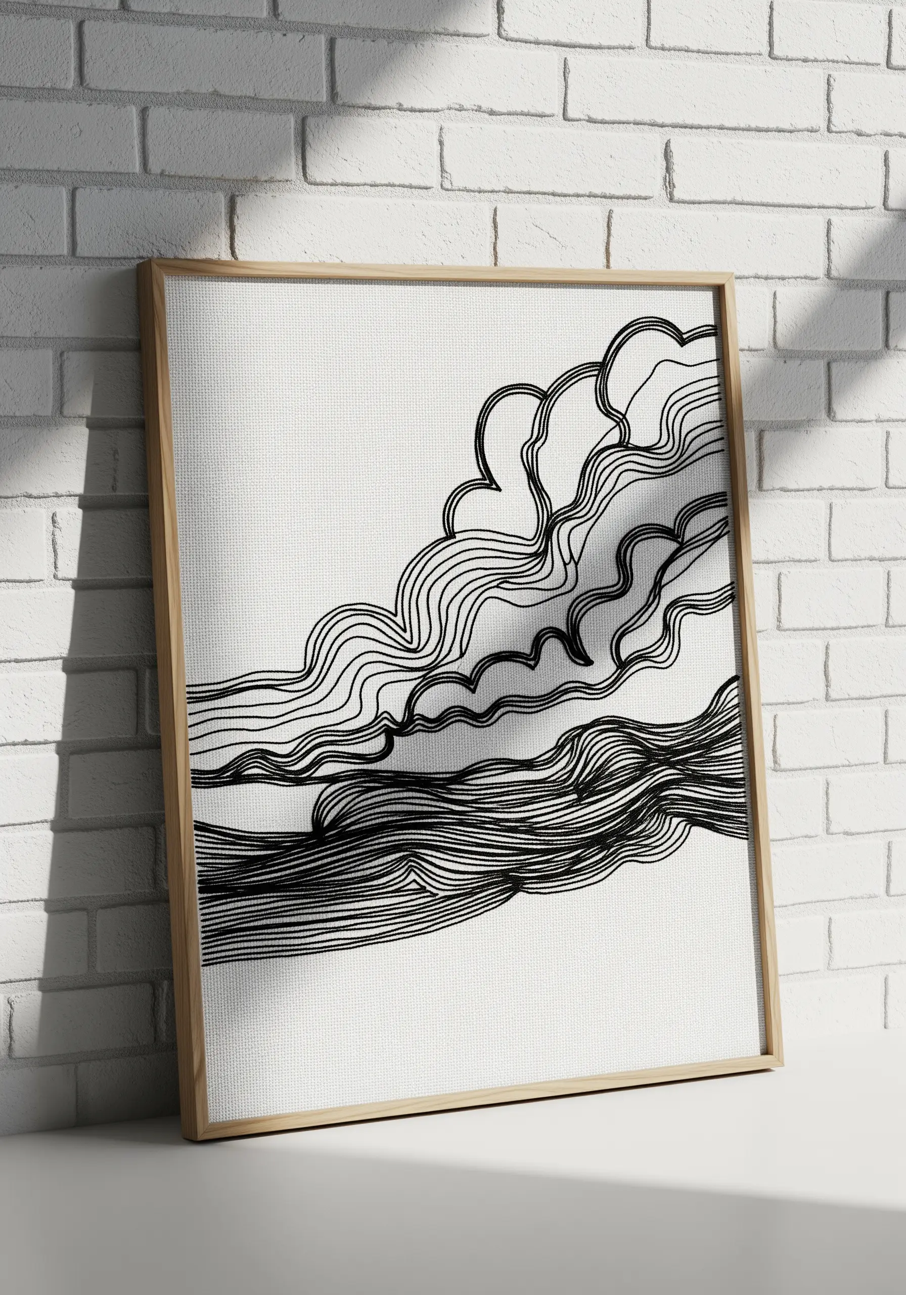 Black and white linear landscape embroidery on canvas