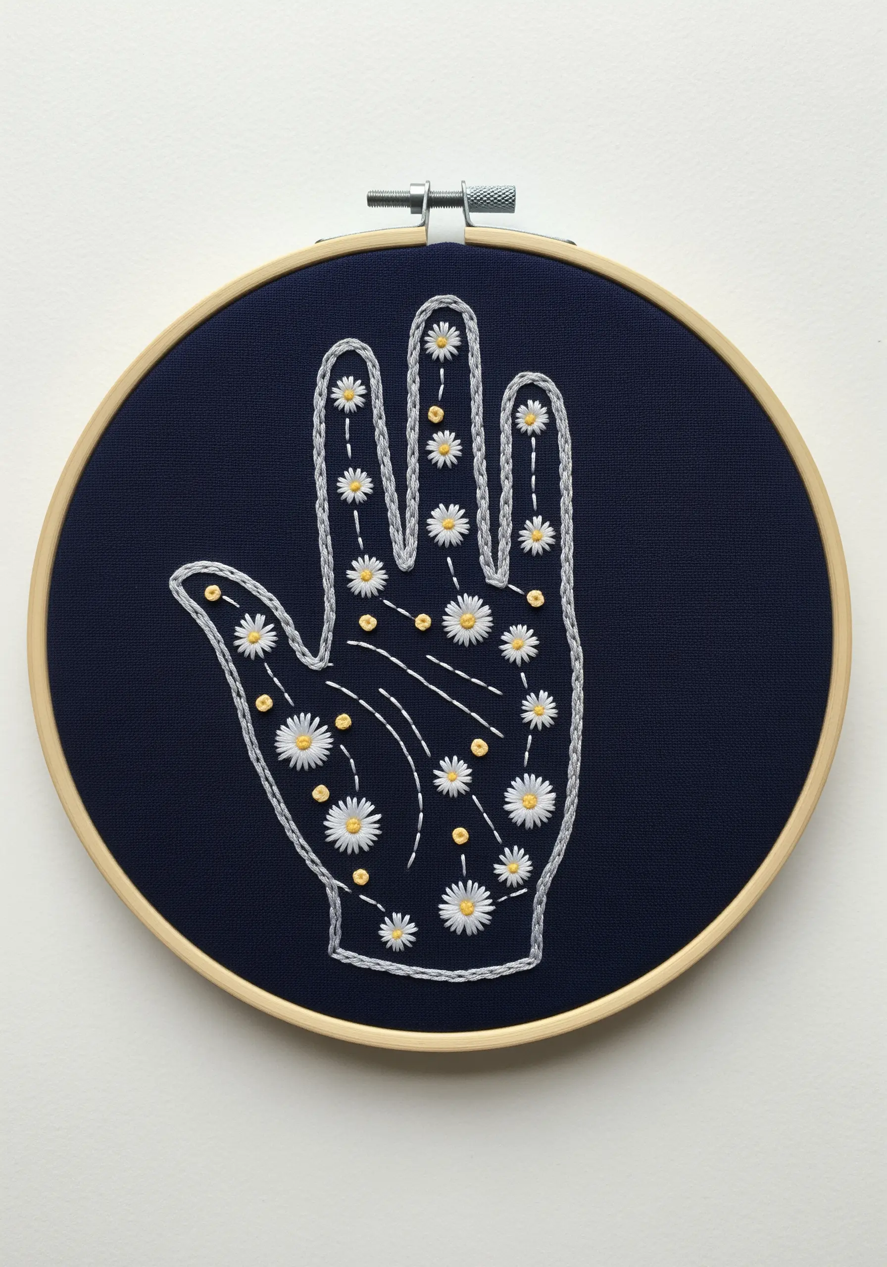 Line art hand outline filled with small stitched daisies and gold French knots.