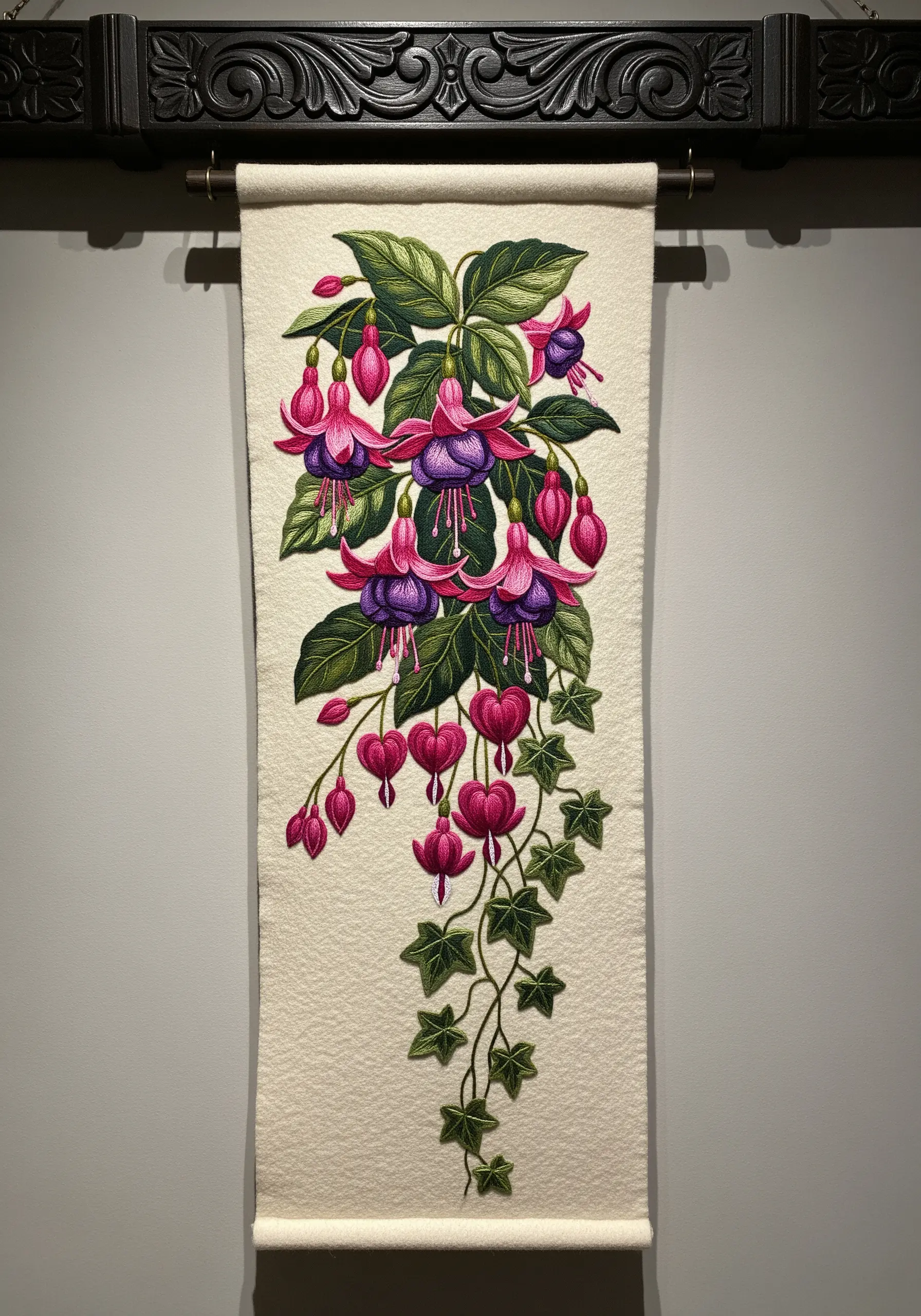 A long wall hanging featuring a cascading embroidered fuchsia plant.