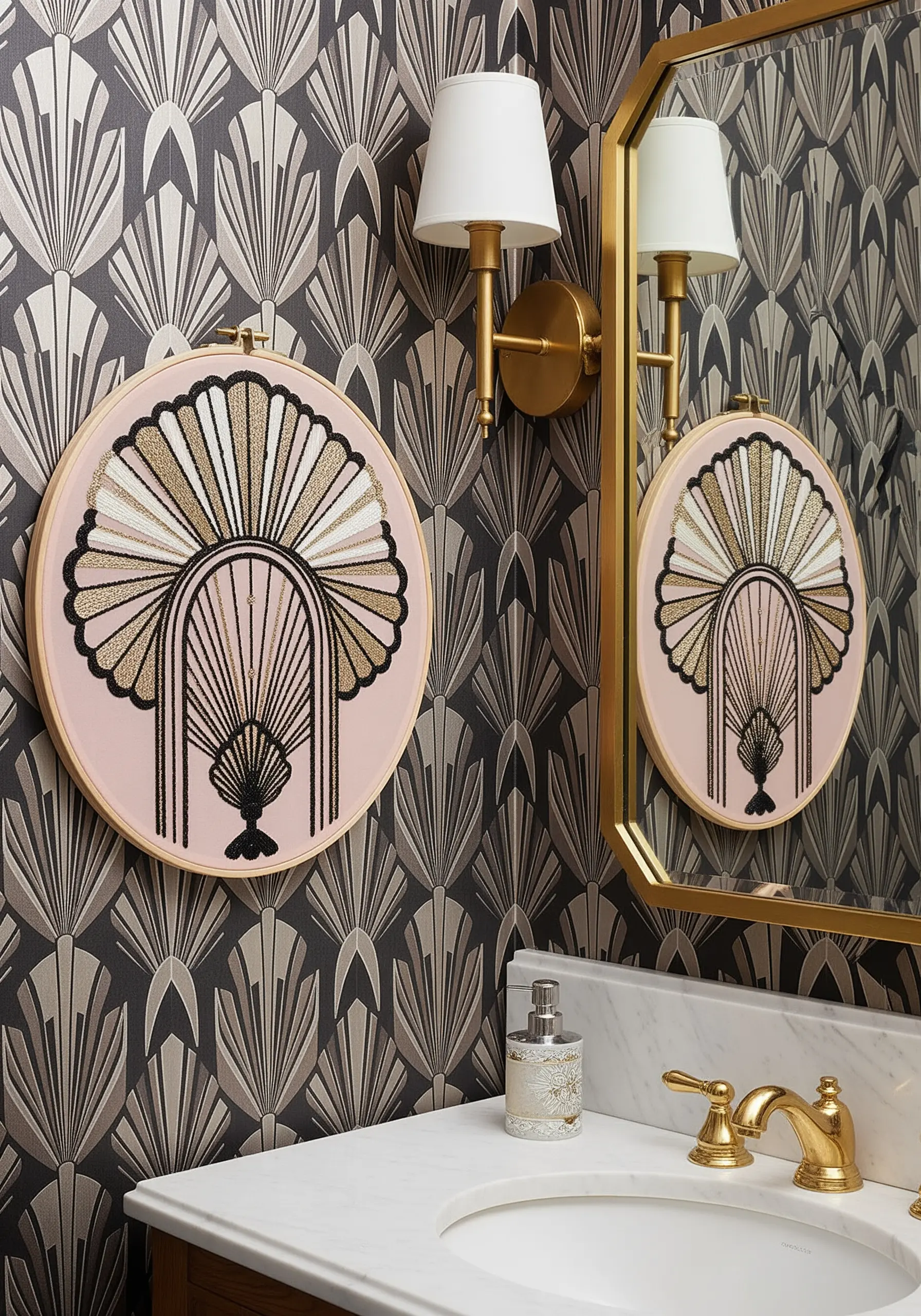 An Art Deco embroidery design in gold, black, and cream on pink fabric.