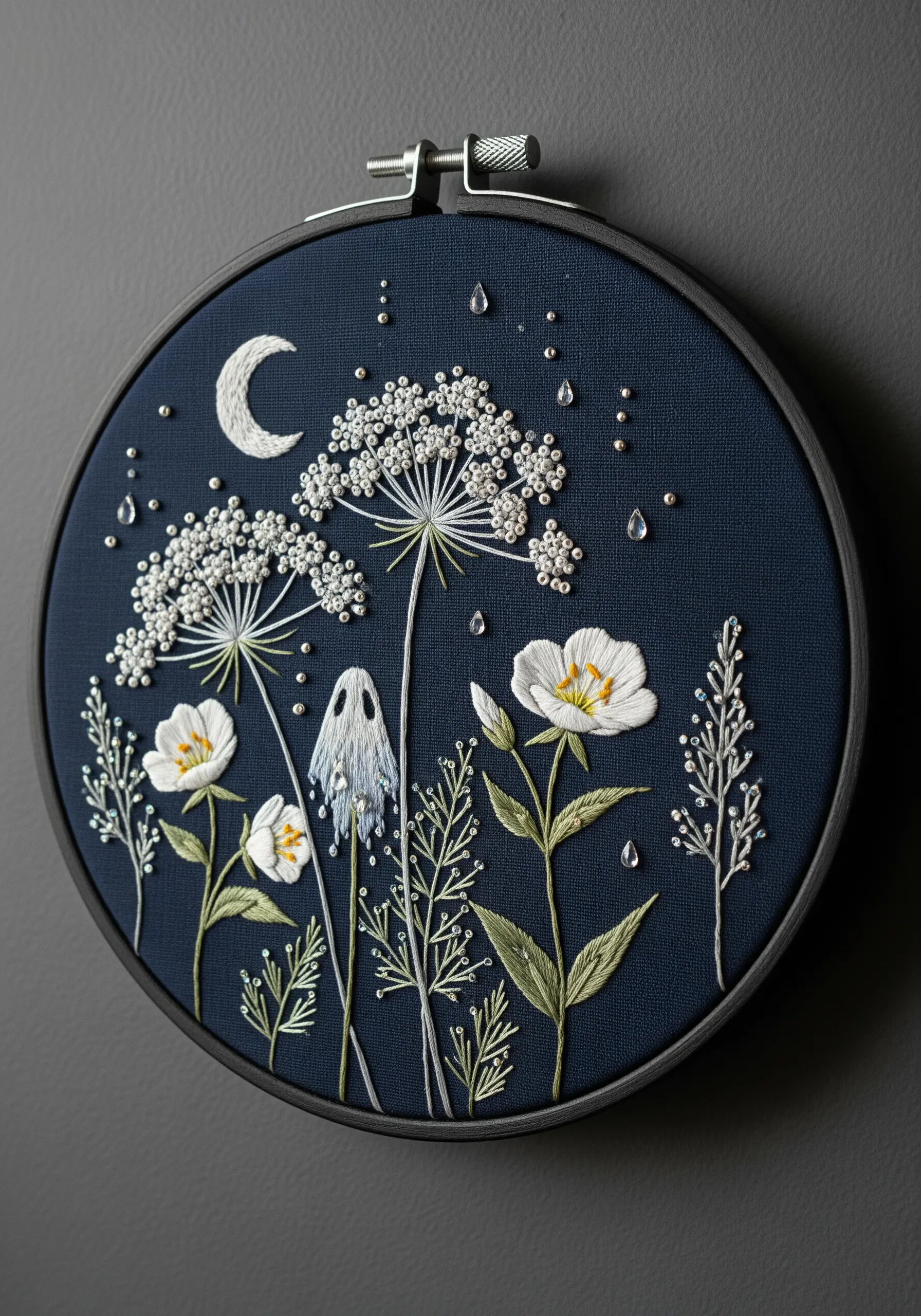 A whimsical night meadow with a tiny ghost, crescent moon, and sparkling bead embellishments.