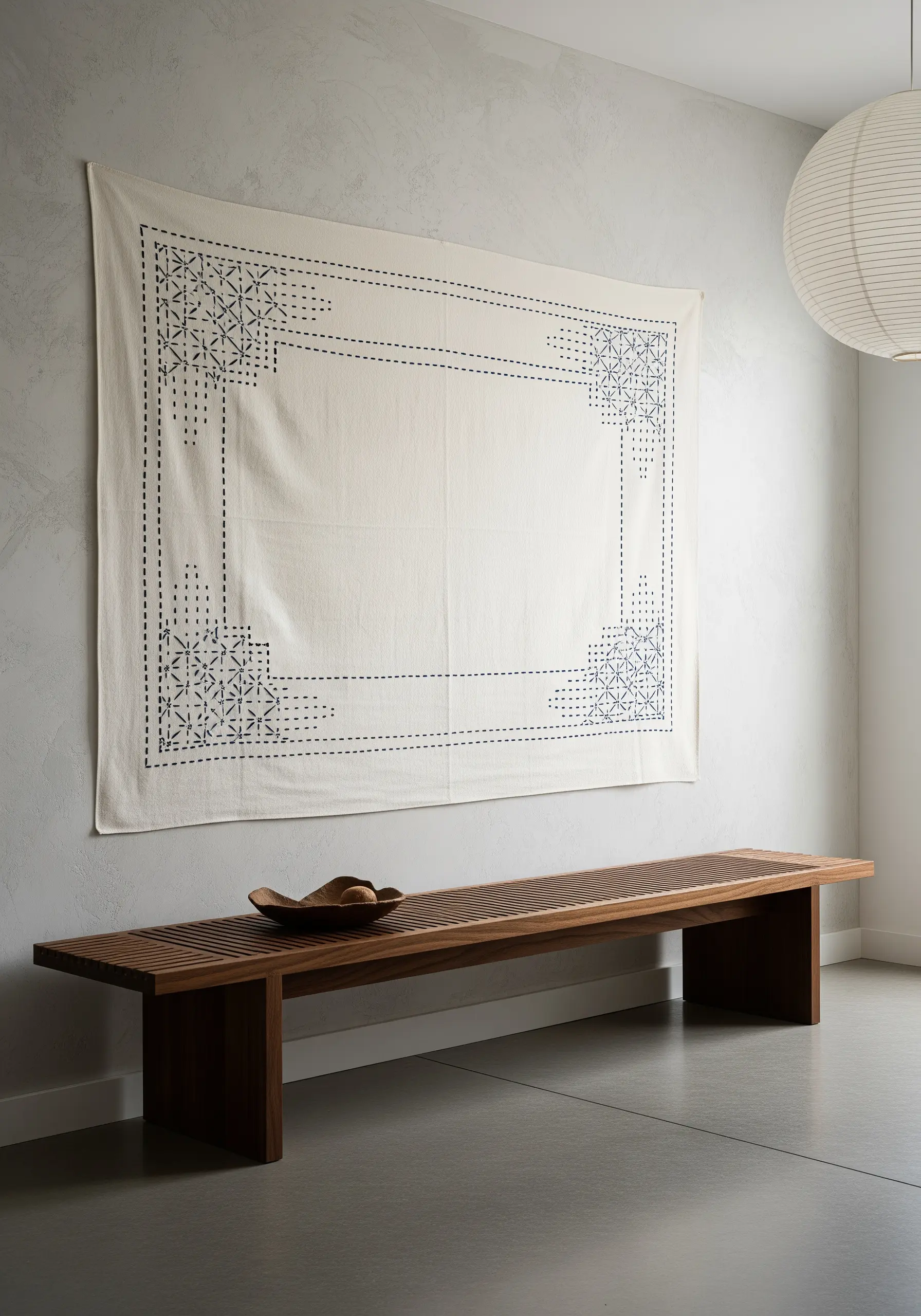 A large, wall-hanging canvas with a Sashiko-inspired running stitch border.