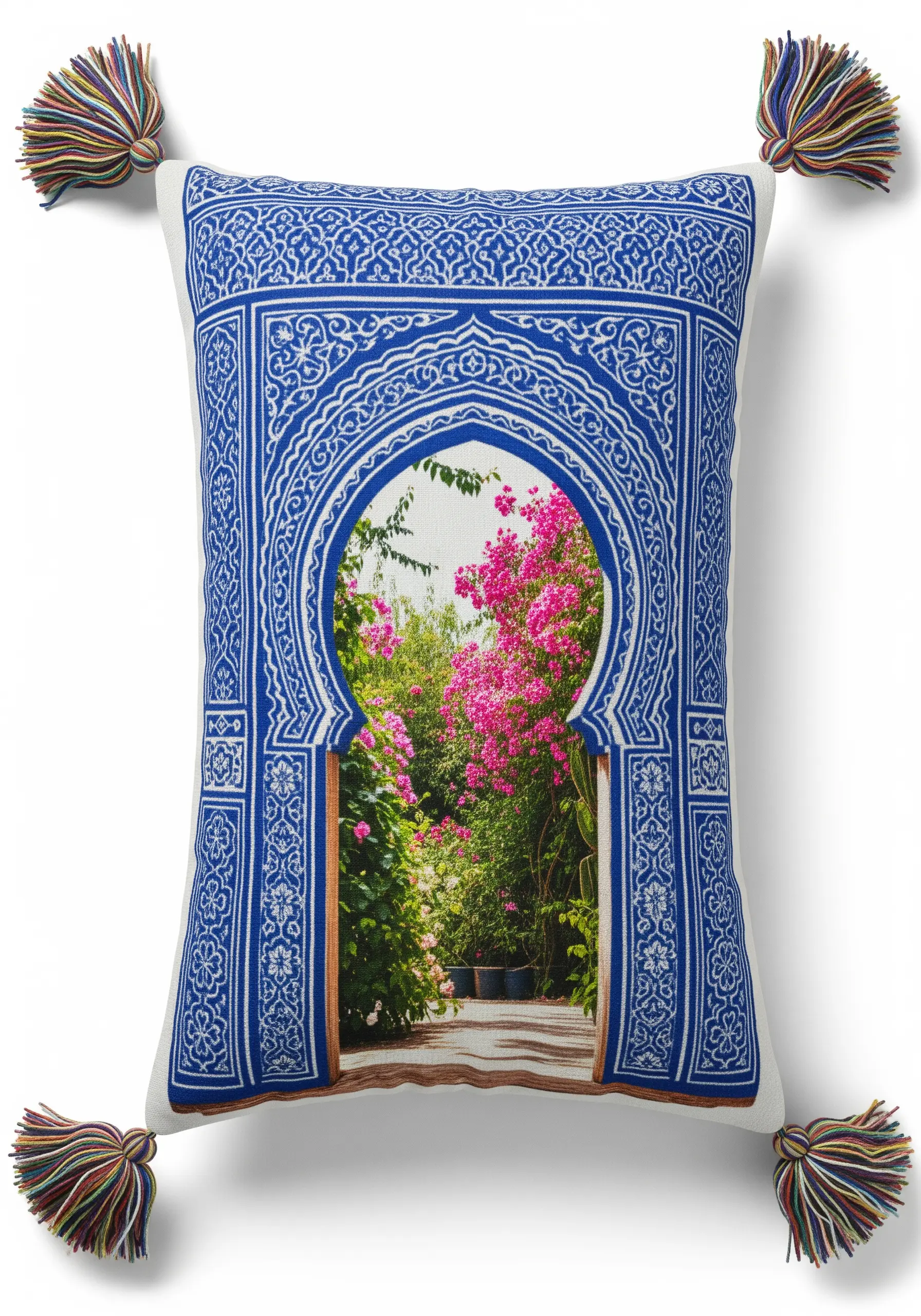 A pillow featuring an embroidered Moroccan archway that frames a printed garden scene.