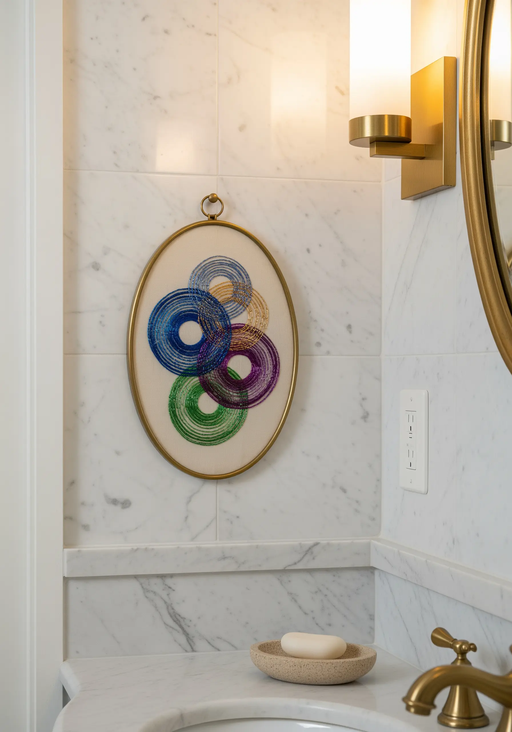 Abstract embroidery of overlapping, multi-colored whipped stitch circles.