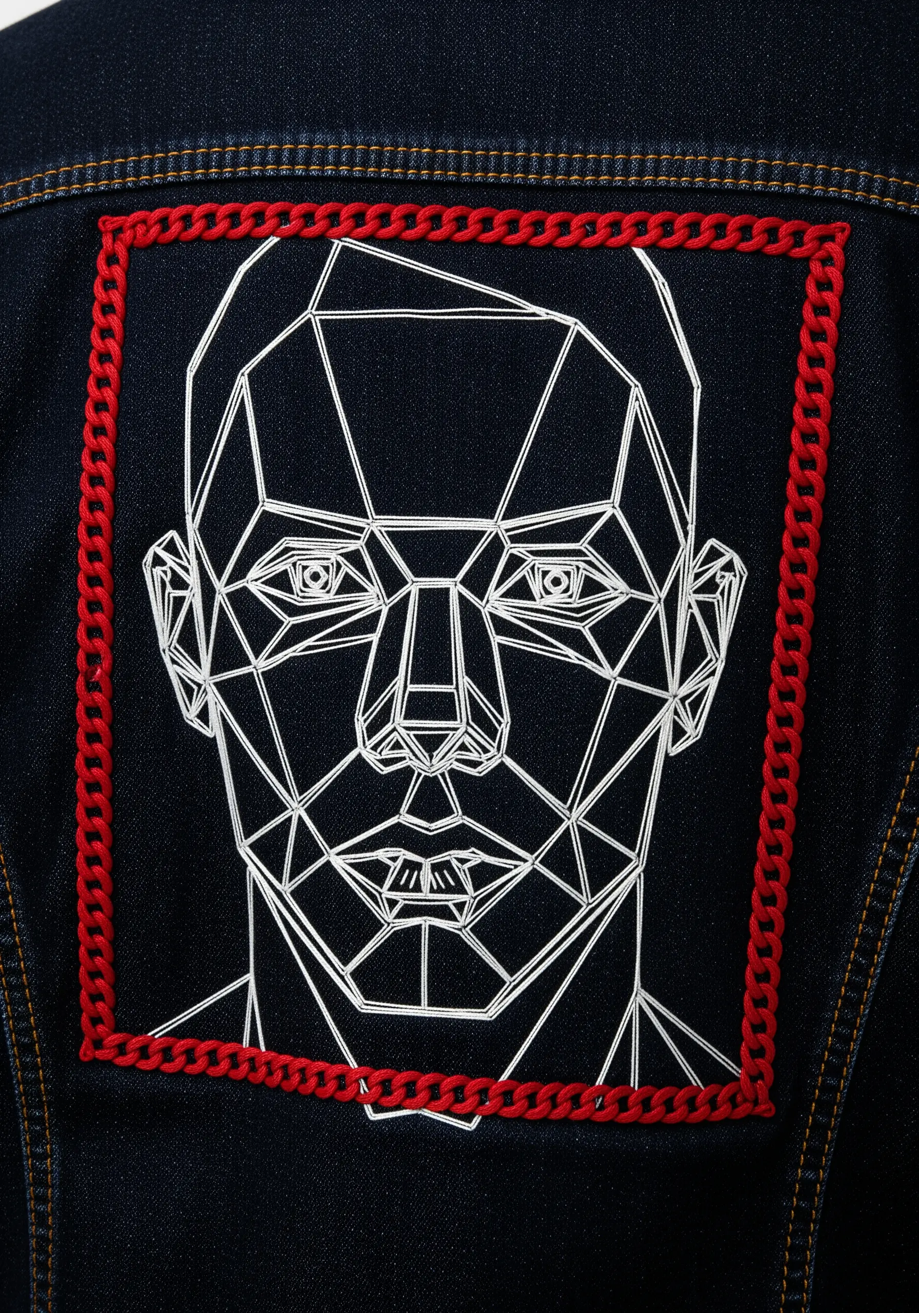 Geometric line-art portrait on dark denim, framed with a bright red metal chain.
