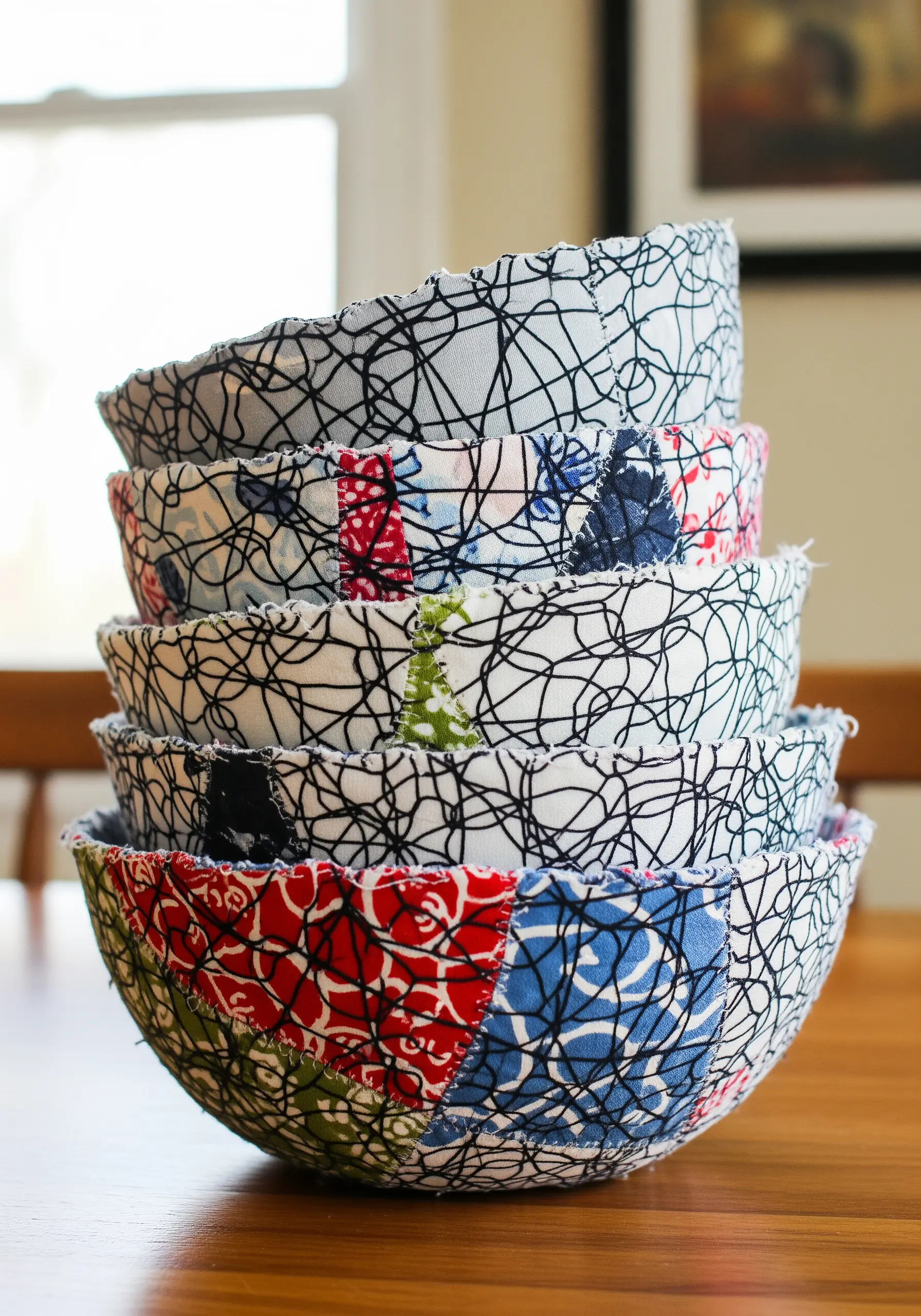 Bowls made of messy thread and fabric scraps